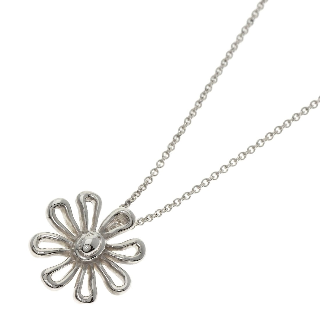 Tiffany Co Tatee Silver Necklace: Tiffany Co Tatee Silver Necklace Tiffany & Co's Tatee Silver Necklace boasts a sleek design with a silver metal construction. The necklace features no main stone, making it a minimalist choice for tho