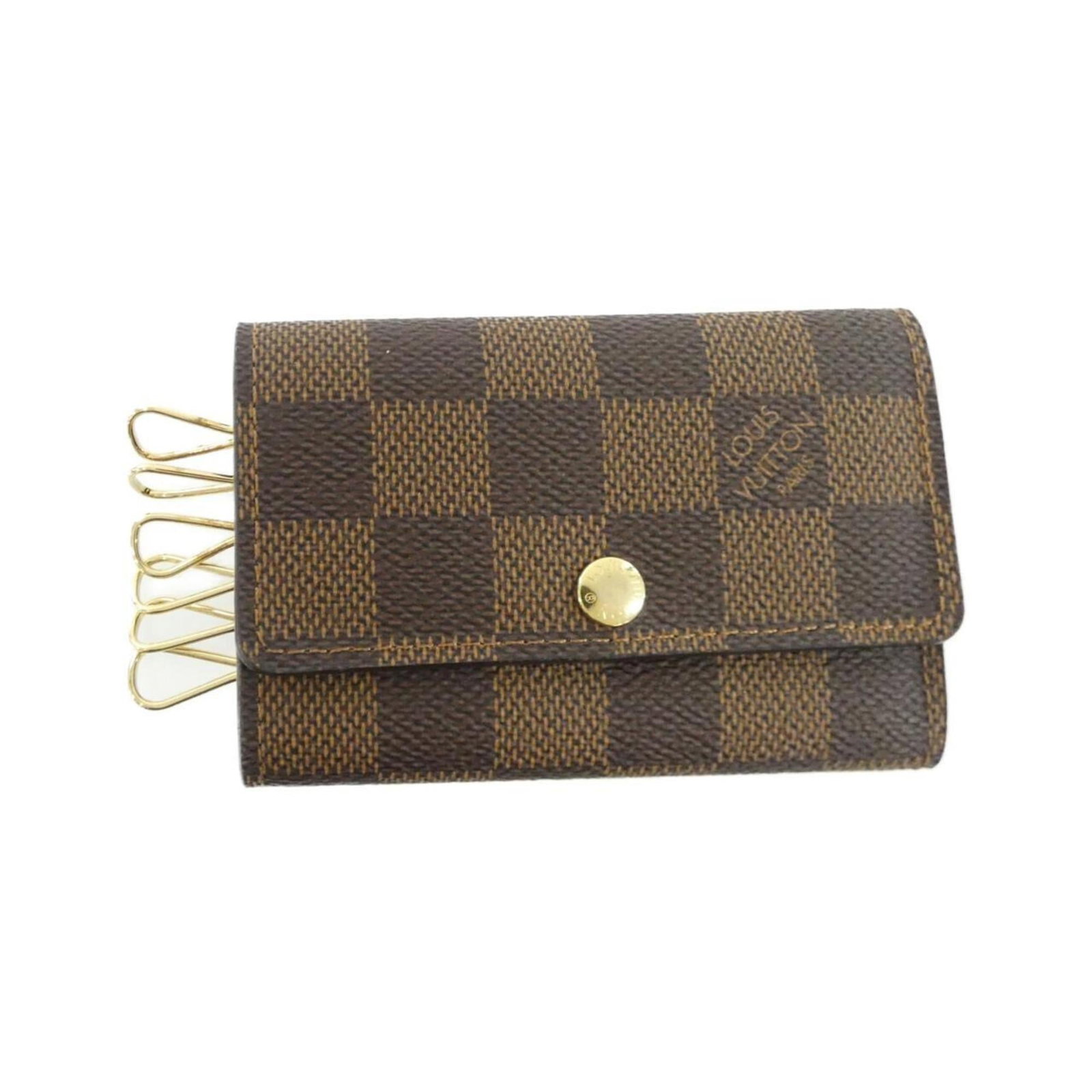 Louis Vuitton Keycase Coated Canvas: Louis Vuitton Keycase Coated Canvas Coated canvas construction provides durability and protection for your belongings. This Louis Vuitton Keycase features Ebene color and has some minor scratches and
