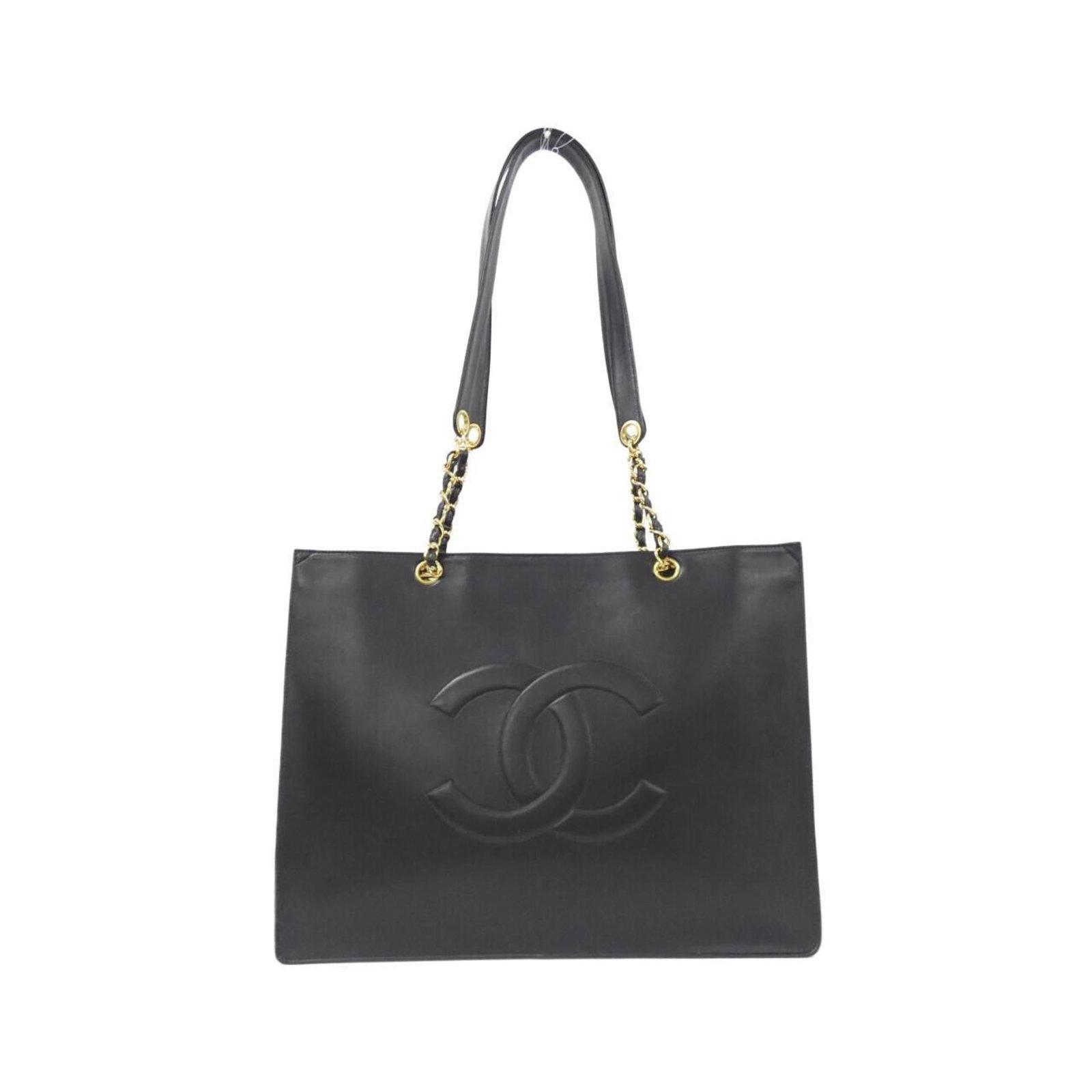 Chanel Handbag Leather: Chanel Handbag Leather This luxurious Chanel handbag features rich black lamb leather and elegant gold hardware, exuding classic sophistication. The bag's clean lines and timeless design make it a