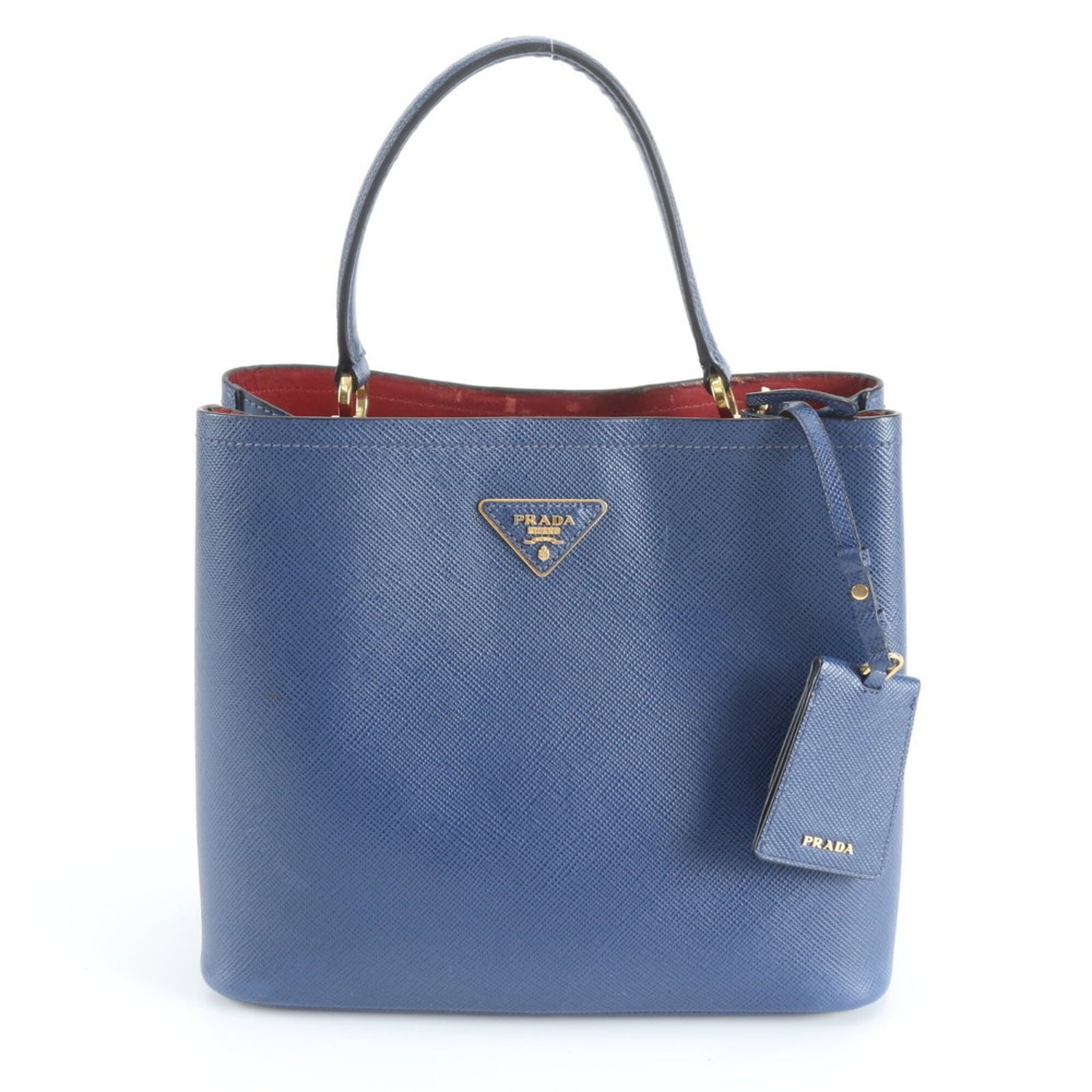 Prada Handbag Tote Bag Leather: Prada Handbag Tote Bag Leather Blue Prada leather tote bag with a classic design. Measuring 27cm x 27cm x 14cm, this handbag features a worn-in look with traces of usage and minor scratches. In good c