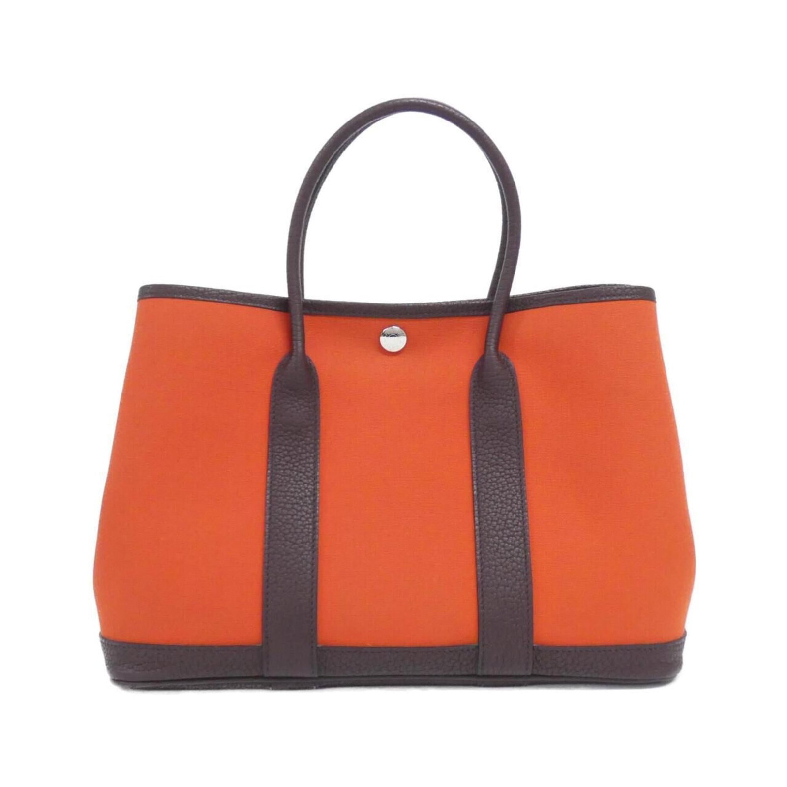 Hermes Handbag Toile Officier Negonda Leather: Hermes Handbag Toile Officier Negonda Leather Toile Officier Negonda Leather Handbag from Hermes - A vibrant orange handbag with Negonda leather, this iconic design features a unique combination of