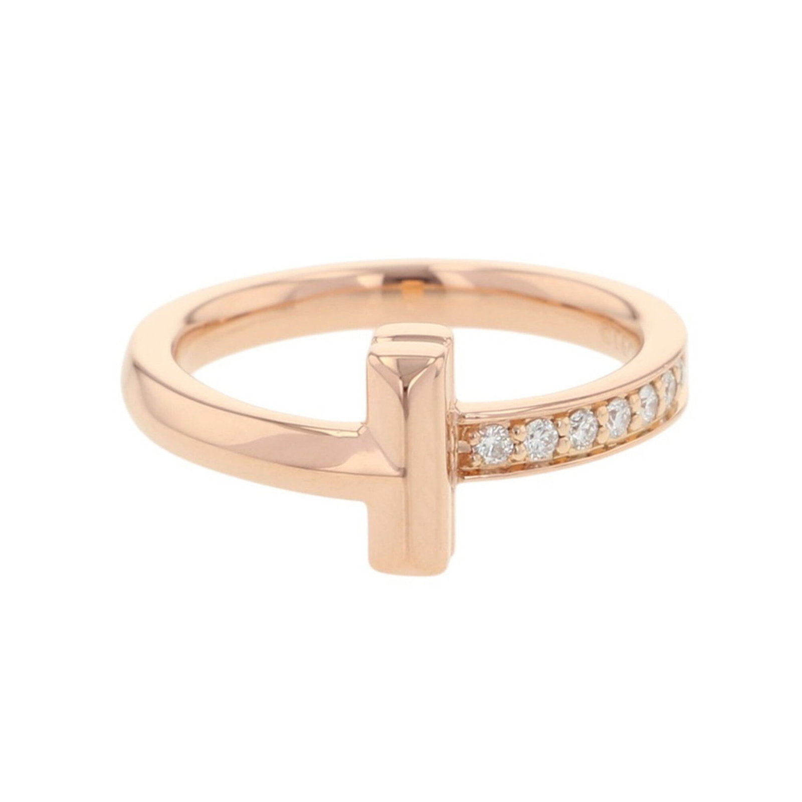 Tiffany Band Ring Pink Gold (18K): Tiffany Band Ring Pink Gold (18K) Tiffany's iconic pink gold band ring features a delicate diamond setting, weighing 0.08 carats in a stunning 18K pink gold design. This elegant ring boasts a sleek an