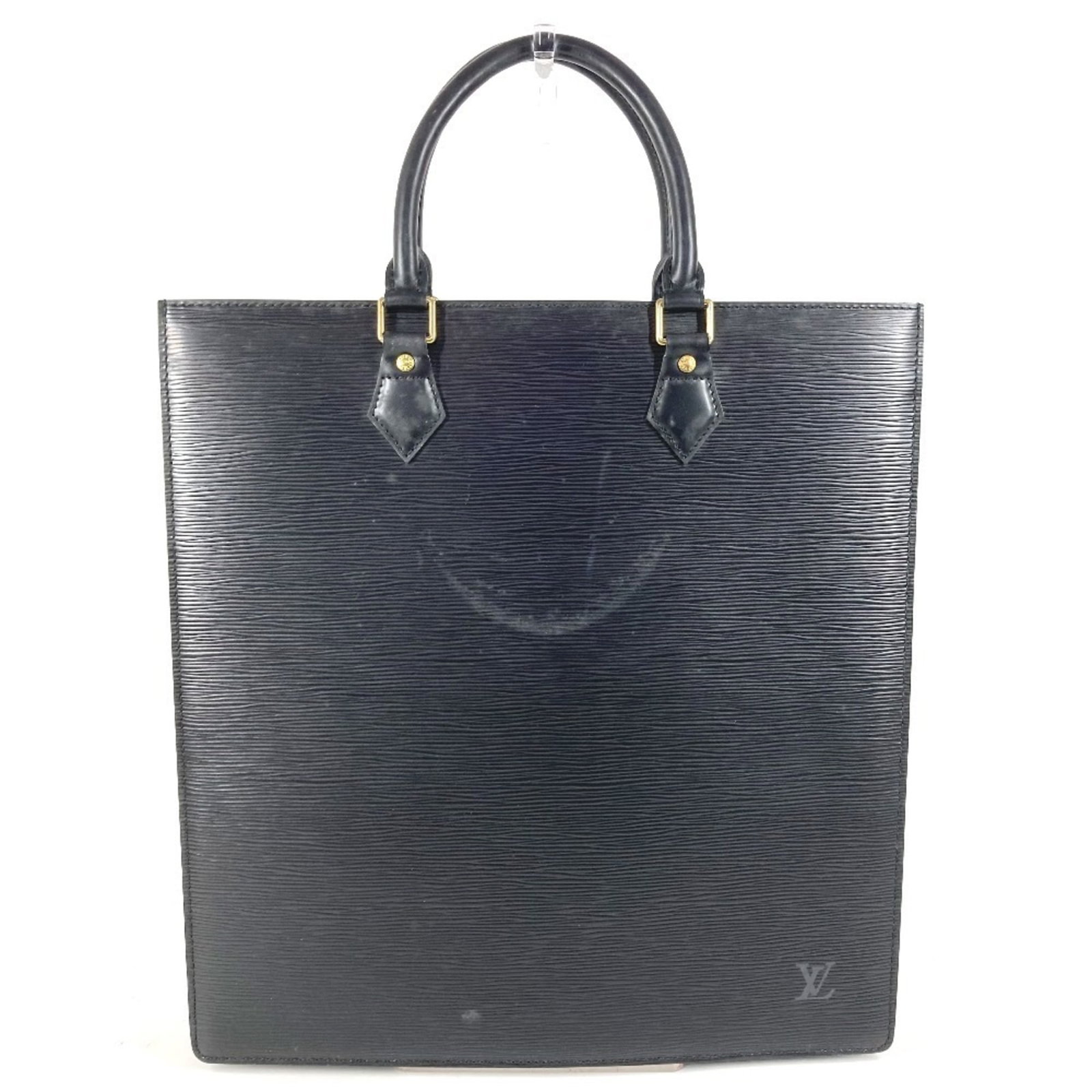 Louis Vuitton Handbag Tote Bag Epi Leather: Louis Vuitton Handbag Tote Bag Epi Leather Black Epi Leather Louis Vuitton Handbag Tote Bag with traces of usage and minor scratches. This pre-owned tote bag features high-quality Epi leather construc