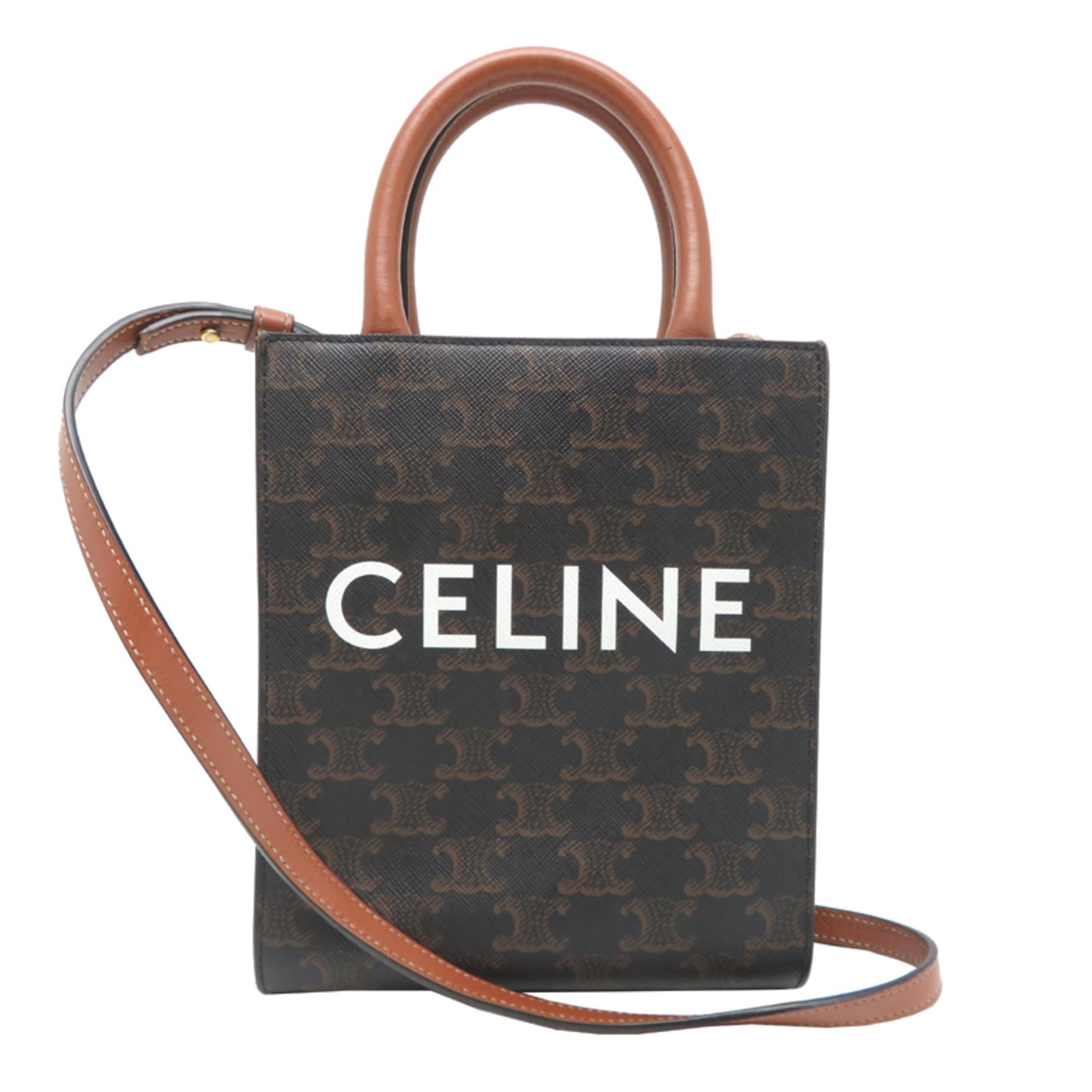 Celine Handbag Pvc Leather: Celine Handbag Pvc Leather This Celine handbag features a unique combination of pvc and leather materials in a rich brown color. With its compact size and classic design, it's perfect for everyday use