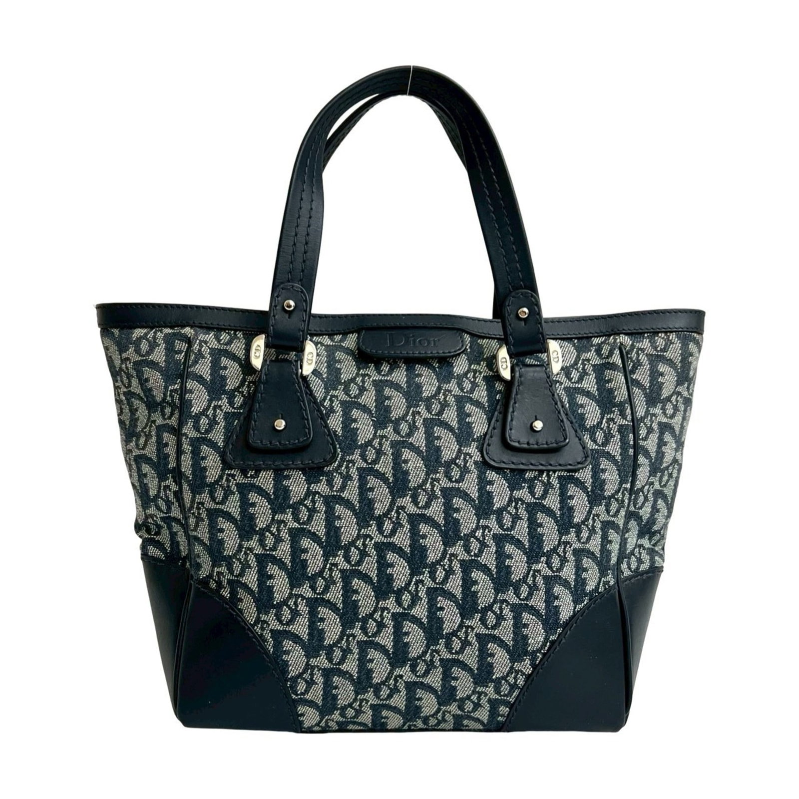 Christian Dior Handbag Tote Bag Canvas Leather: Christian Dior Handbag Tote Bag Canvas Leather Canvas and leather blend in this Christian Dior handbag tote bag, featuring a classic navy color. The bag has been used and shows signs of wear, includin