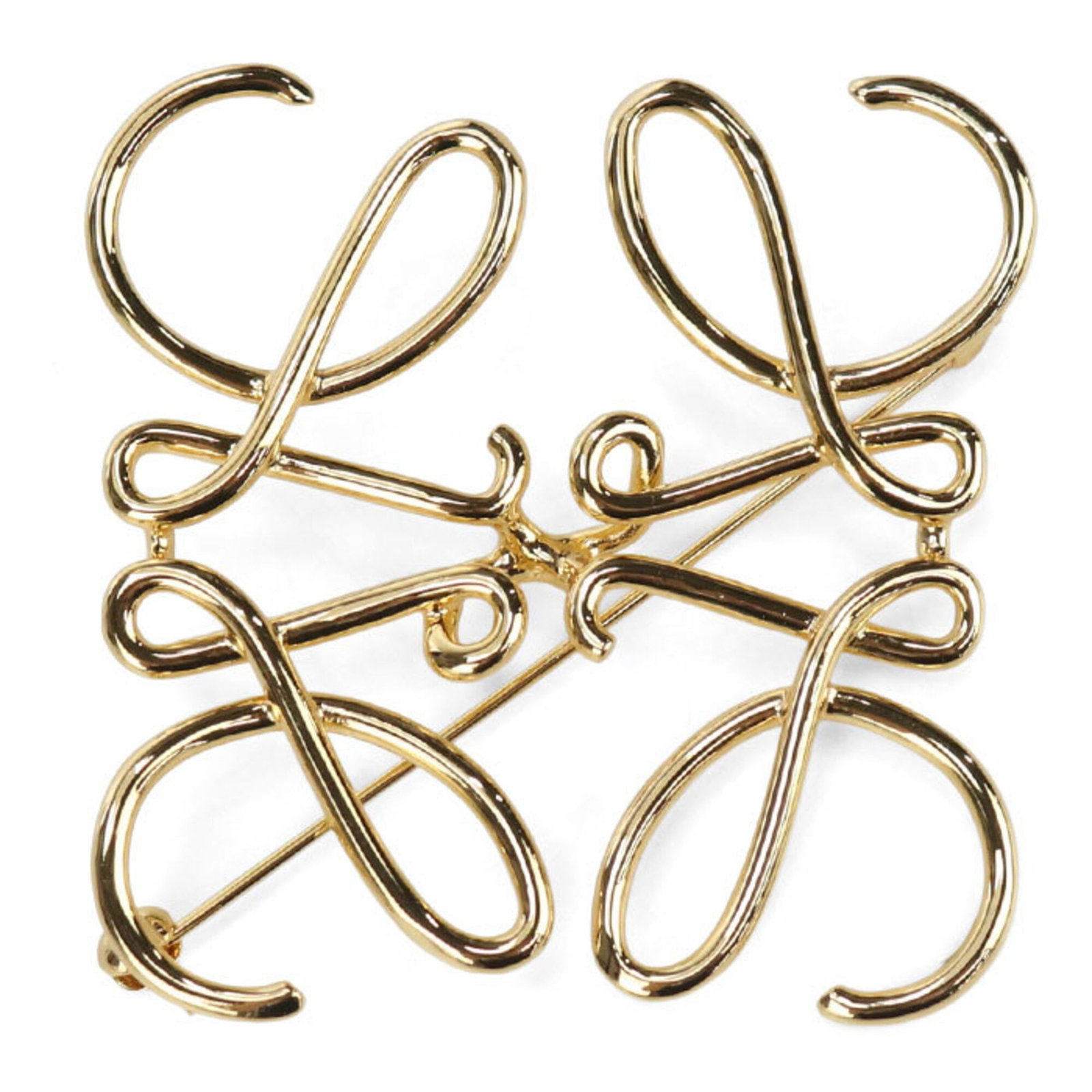 Loewe Brooch Metal: Loewe Brooch Metal This gold Loewe brooch features a metal design with a few traces of usage, some scratches and dirt visible. Despite its worn appearance, the piece remains in very good condition. Th