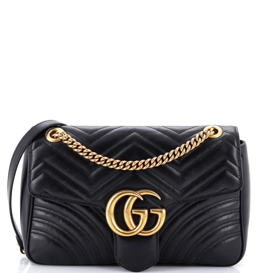 Marmont flap bag medium matelasse leather Gucci GG: Marmont flap bag medium matelasse leather Gucci GG The Gucci GG Marmont Flap Bag in medium size features matelasse leather exterior and microfiber interior. Black exterior with aged gold hardware adds