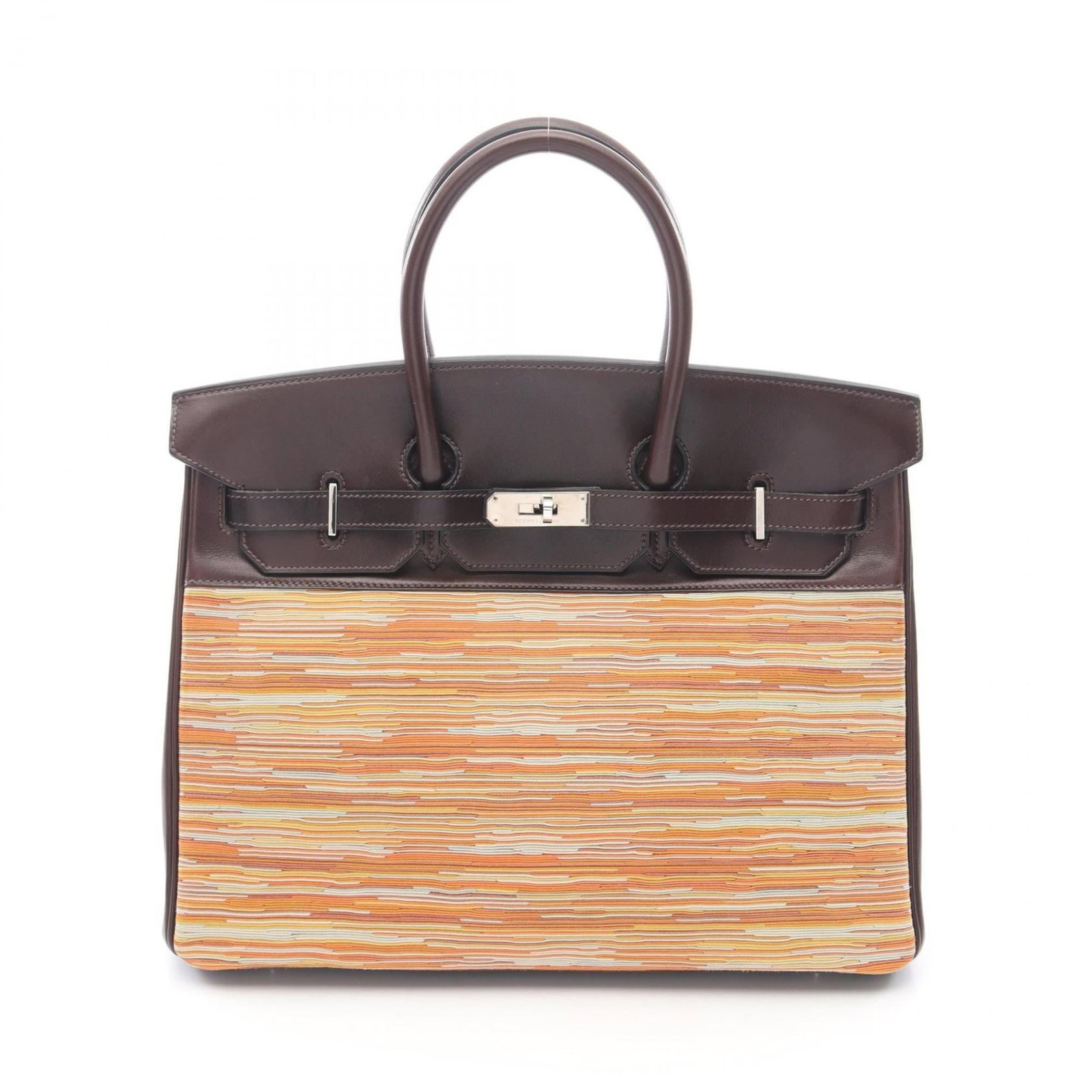 Hermes Handbag Leather: Hermes Handbag Leather Barenia Leather, Calfskin, and Vibrato Snip leather come together in this unique handbag from Hermes. The rich brown color and multi-color accents add depth to this stylish