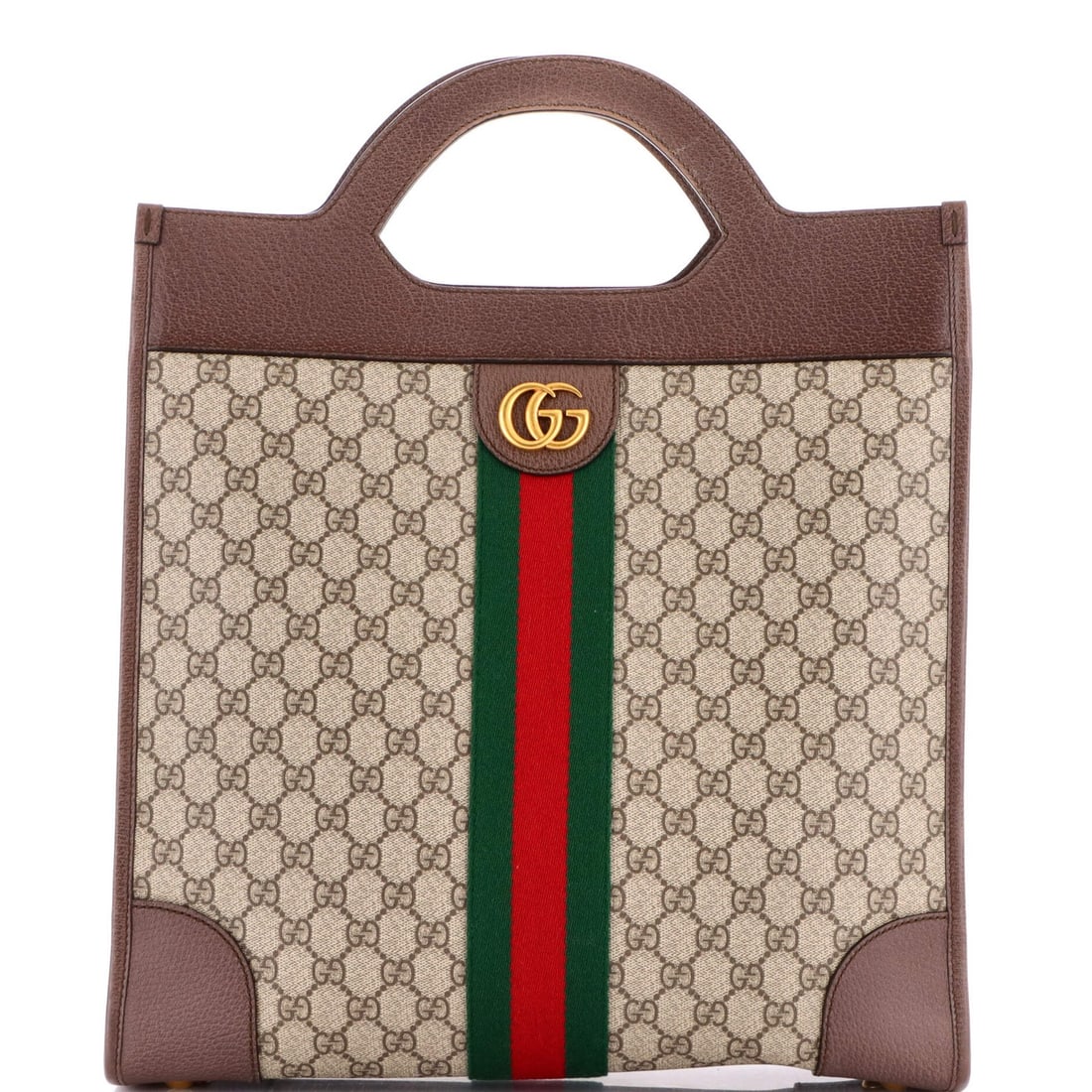 Cut out medium GG canvas tote: Cut out medium GG canvas tote Tote up style and sophistication with this medium Gucci Ophidia cut-out handle tote. Featuring a classic brown GG coated canvas exterior with neutral interior, this timel