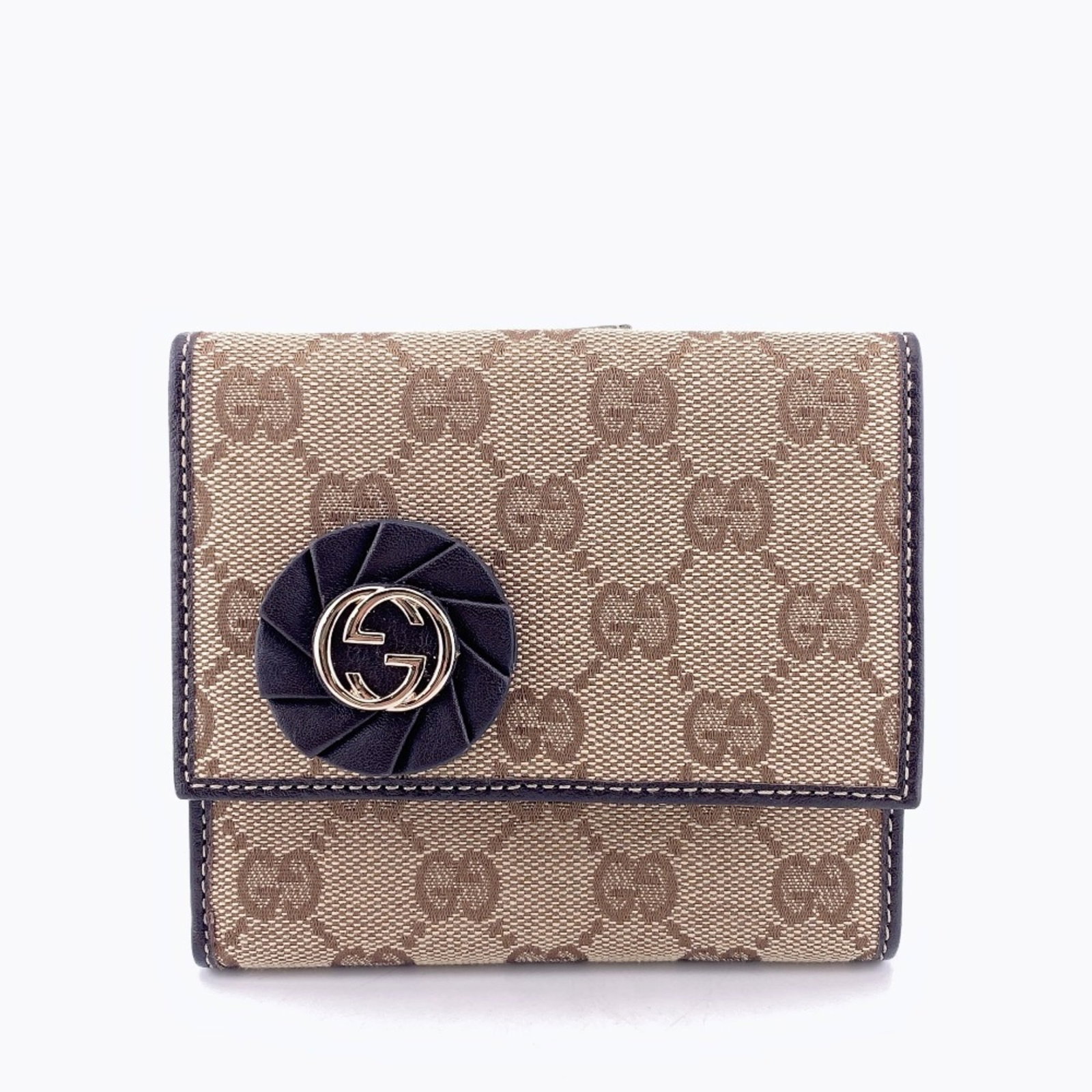 Gucci Wallet (Bi-Fold) Canvas Leather: Gucci Wallet (Bi-Fold) Canvas Leather Gucci's iconic bi-fold wallet features high-quality canvas and leather construction in a timeless beige and beige brown color combination. With its classic design