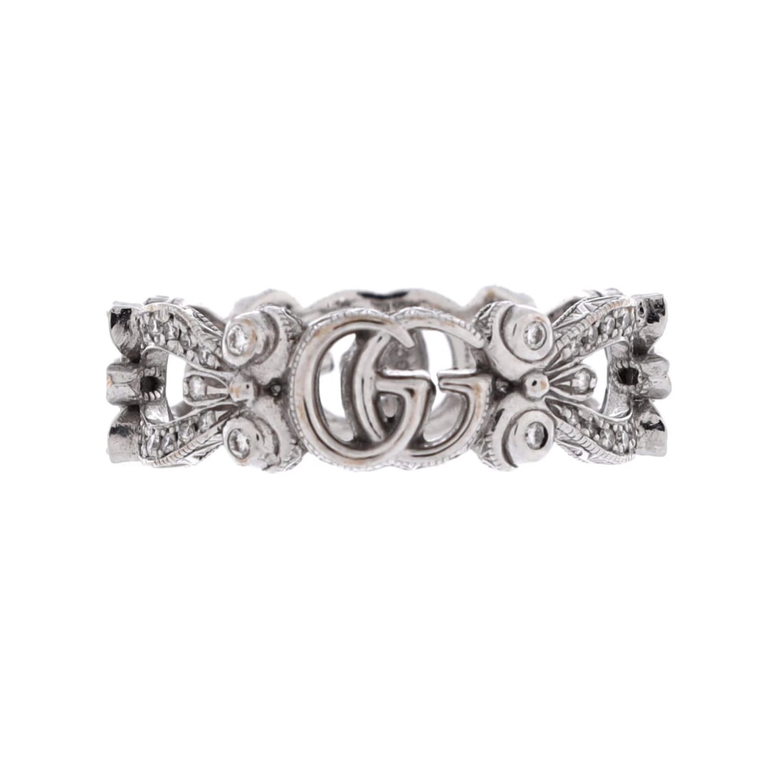 Flora GG Ring with Diamonds 18K White Gold Gucci: Flora GG Ring with Diamonds 18K White Gold Gucci 18K White Gold Gucci's GG Flora Band Ring features a stunning diamond set in an 18K white gold band. The ring boasts a classic design with a prominent 