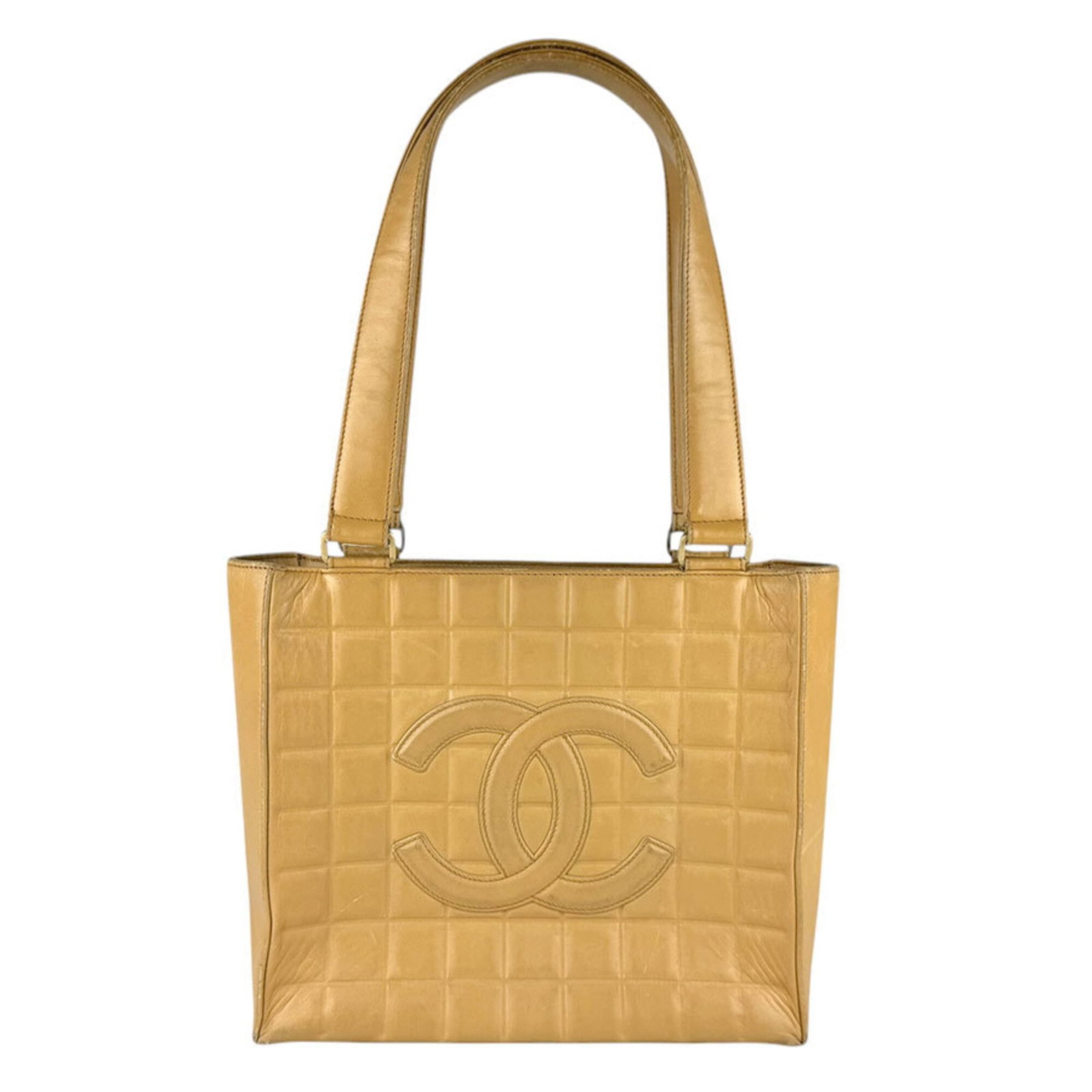 Chanel Shoulder Bag Tote Bag Leather: Chanel Shoulder Bag Tote Bag Leather This Chanel shoulder bag tote features high-quality beige leather and a classic design. With its timeless style and spacious interior, it's perfect for everyday us