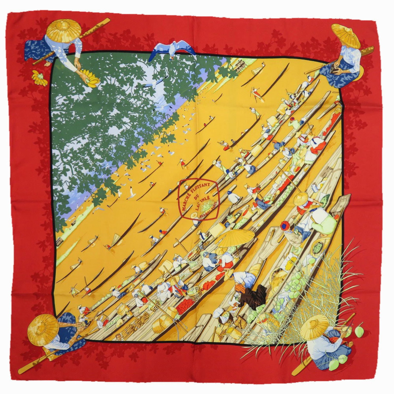 Hermes Scarf Silk: Hermes Scarf Silk Silk scarf from renowned French fashion house Hermes, boasting vibrant green and orange hues. This everyday accessory features a subtle sheen to its silk material and measures 88.5cm