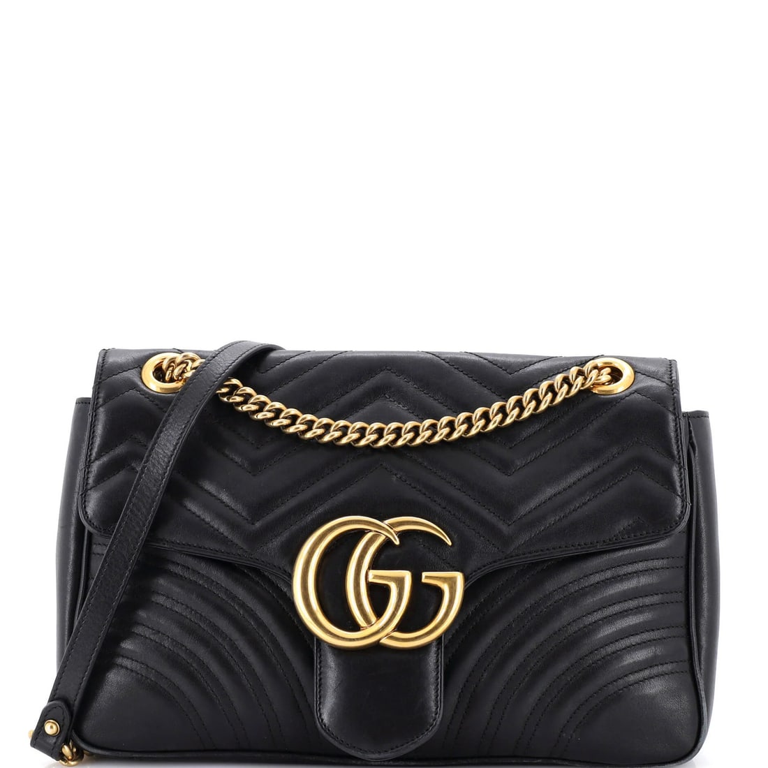 Marmont flap bag medium matelasse leather Gucci GG: Marmont flap bag medium matelasse leather Gucci GG The Gucci GG Marmont Flap Bag in medium size features matelasse leather exterior and microfiber interior. Black exterior with aged gold hardware adds