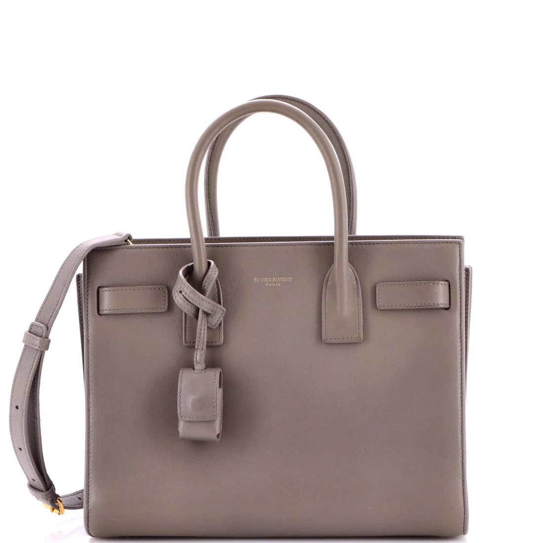 Sac of Saint Laurent Leather Baby Bag: Sac of Saint Laurent Leather Baby Bag The Sac de Jour Bag from Saint Laurent features a timeless gray leather exterior with gold hardware and a classic design. Measuring 8" tall and 10" wide, this bab