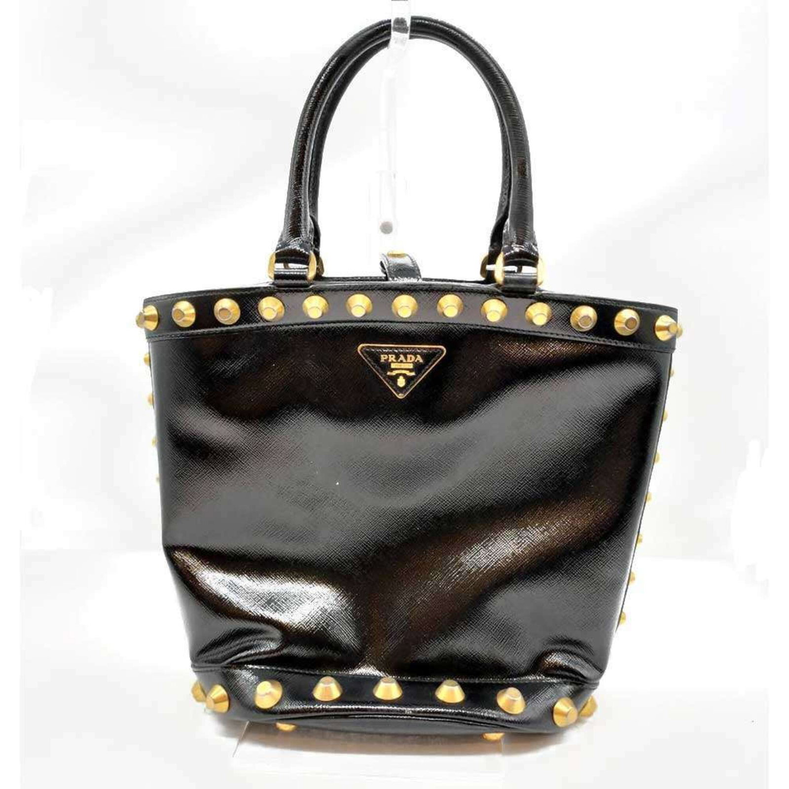 Prada Handbag Tote Bag Saffiano: Prada Handbag Tote Bag Saffiano The Prada Saffiano Tote Bag offers a sleek and sophisticated design, crafted from durable Saffiano leather. With its classic black color and timeless size, this versati