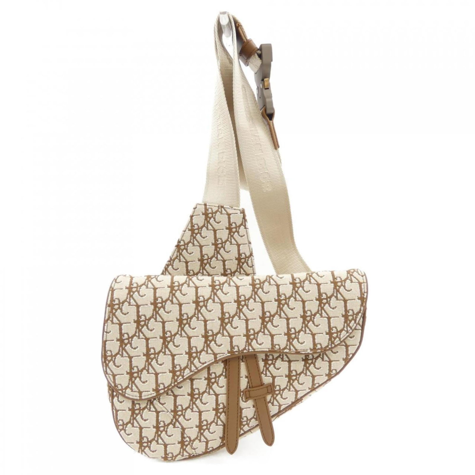 Christian Dior Handbag: Christian Dior Handbag Christian Dior Handbag in Beige and Brown. This used handbag from Christian Dior features a classic design with a few traces of usage, some scratches and dirt visible, yet overa