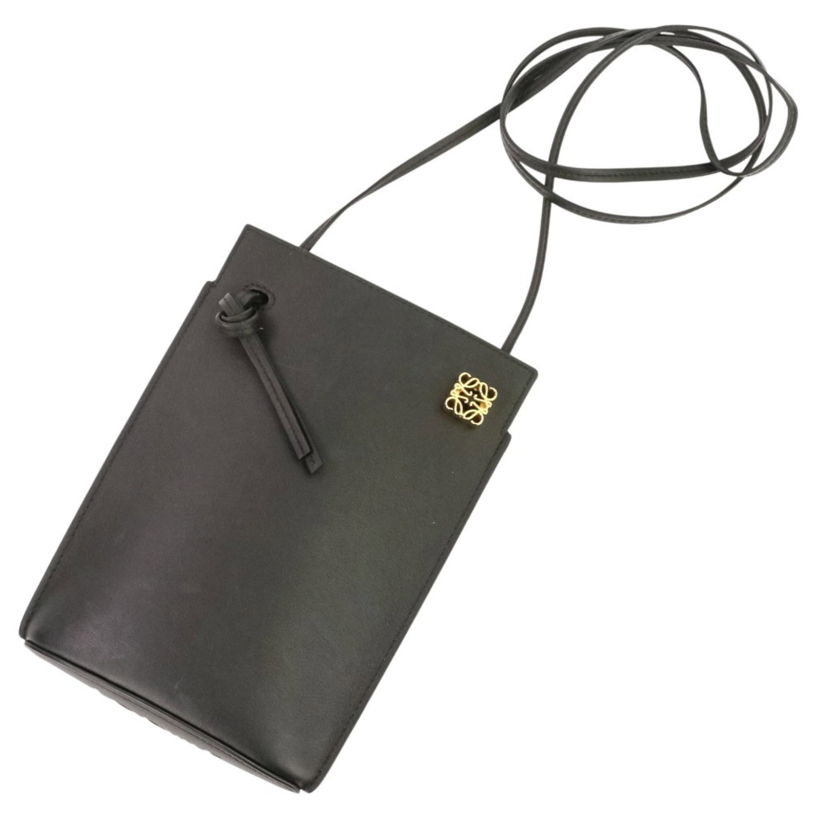 Loewe Phone Wallet Leather: Loewe Phone Wallet Leather The Loewe Phone Wallet Leather is a sleek and sophisticated accessory made from high-quality leather. Its compact size and slim design make it easy to carry in a pocket or p