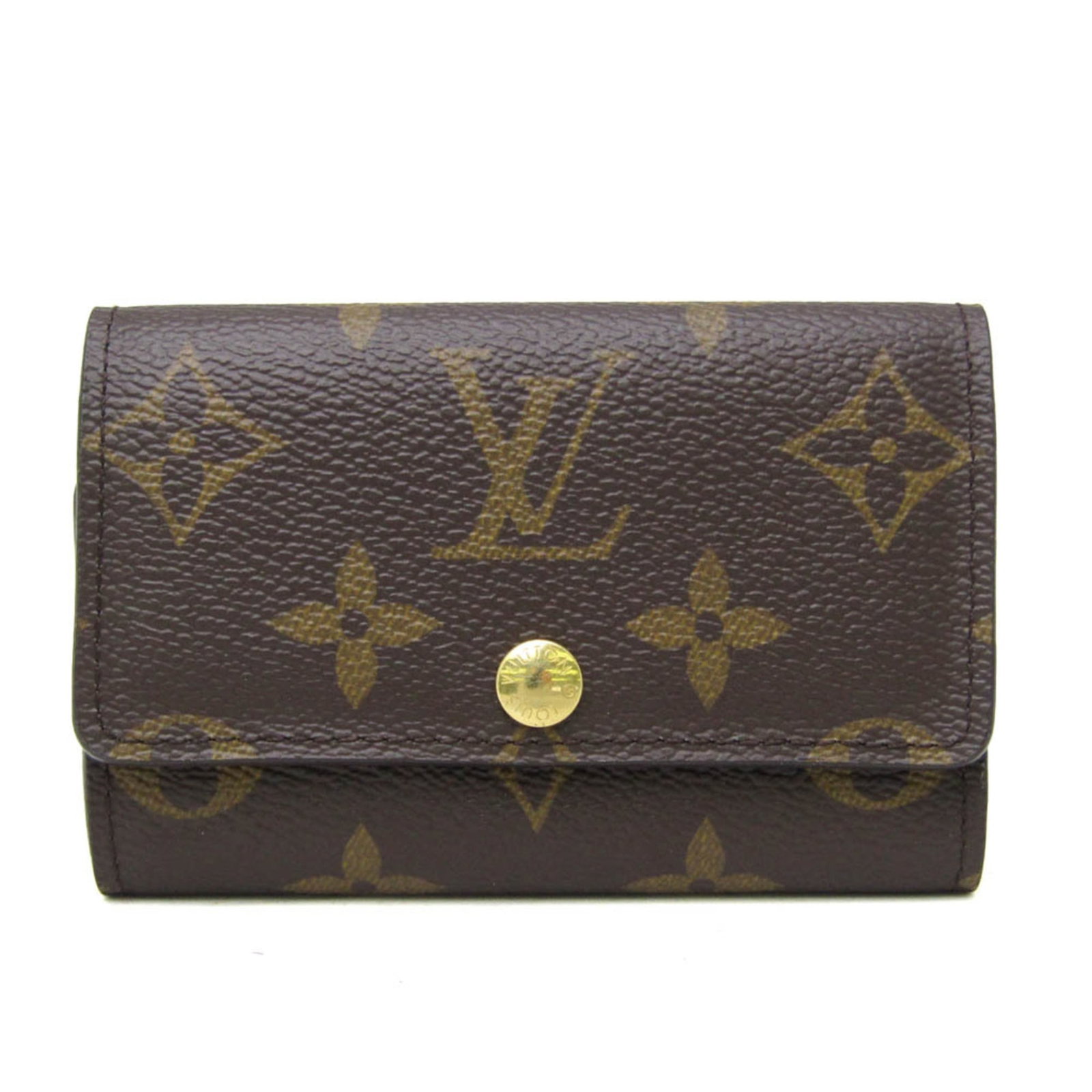 Louis Vuitton Keycase Monogram: Louis Vuitton Keycase Monogram This Louis Vuitton Keycase Monogram features a classic brown color and iconic monogram pattern. With its snap closure and six key hooks, it provides ample storage for ev