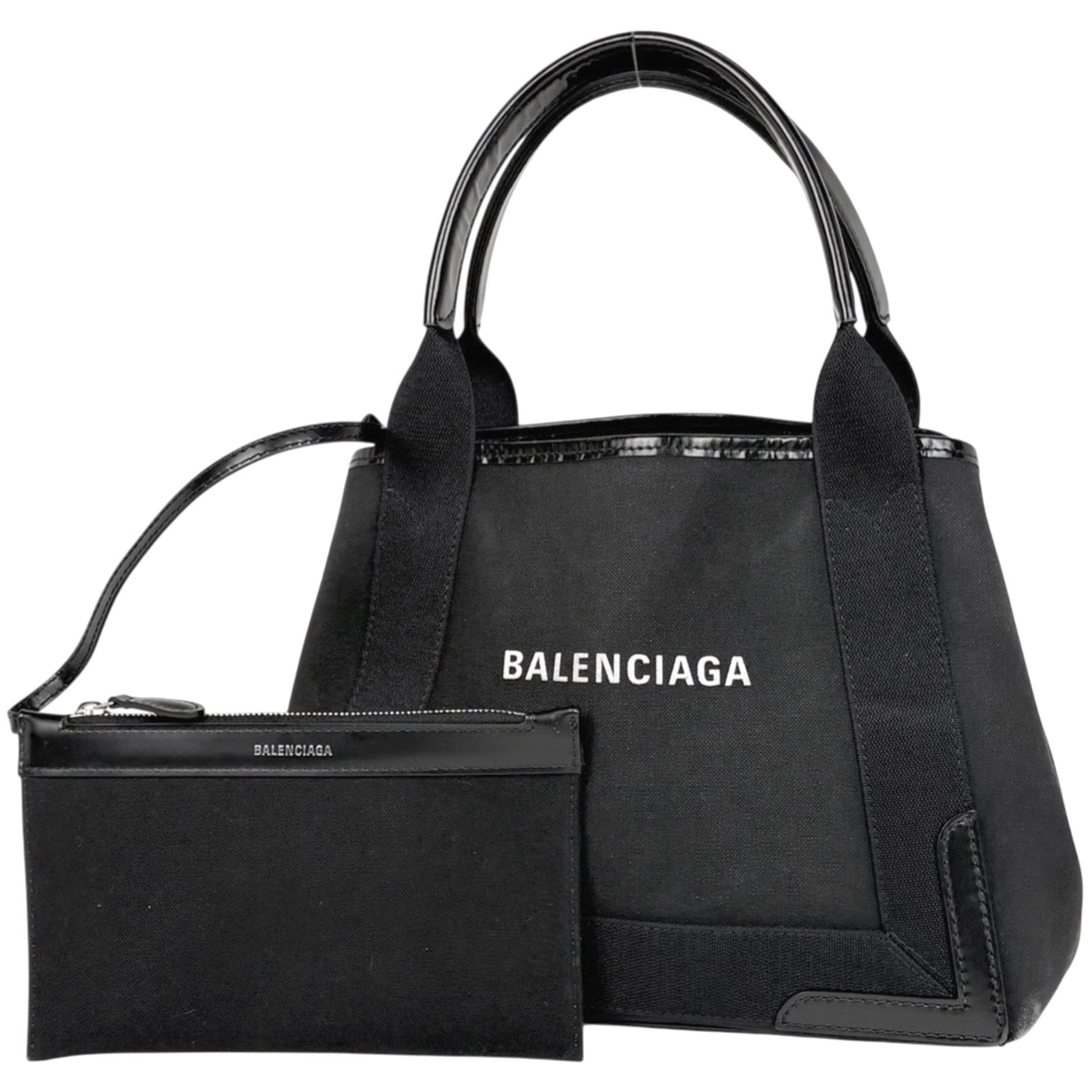 Balenciaga Handbag Pouch Tote Bag Canvas Leather: Balenciaga Handbag Pouch Tote Bag Canvas Leather Canvas and leather come together in this Balenciaga handbag pouch tote bag. Traces of usage are visible, with scratches and dirt present, but overall