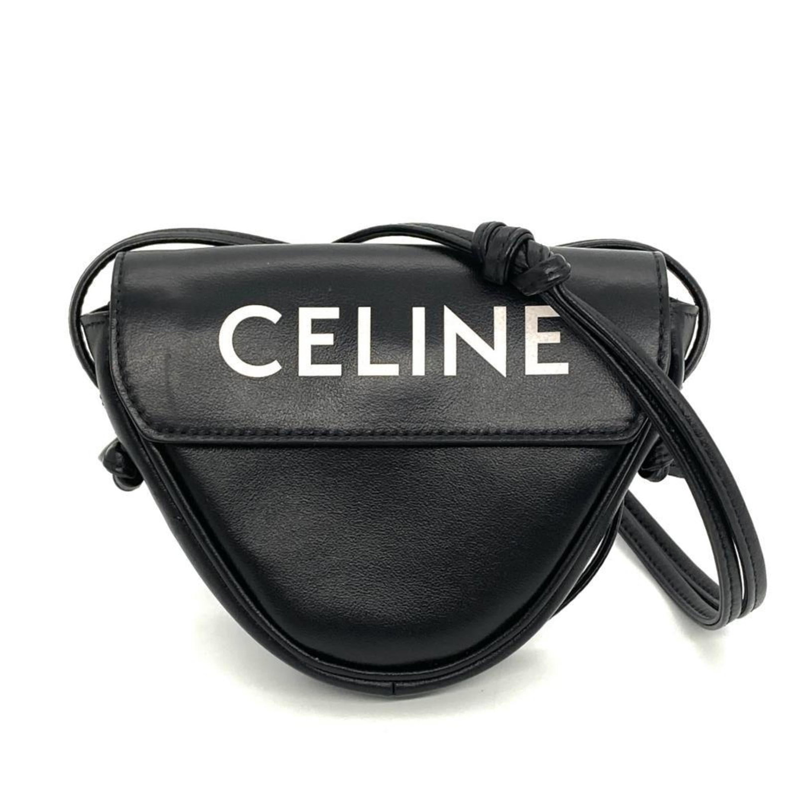 Celine Shoulder Bag Leather: Celine Shoulder Bag Leather A sleek and sophisticated black leather shoulder bag from Celine, featuring clean lines and minimalistic design. This pre-owned bag has been well-cared for, with only minor