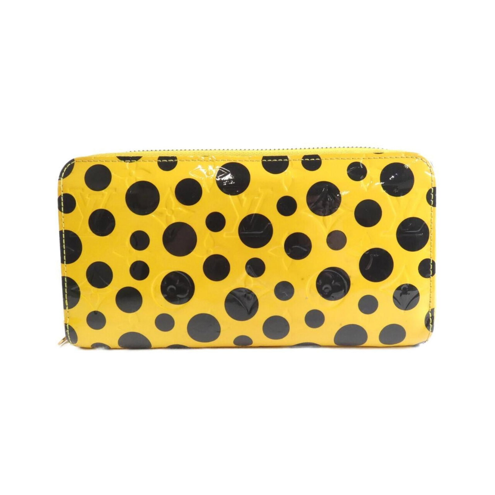 Louis Vuitton Long Wallet (Bi-Fold) Leather: Louis Vuitton Long Wallet (Bi-Fold) Leather The Louis Vuitton Long Wallet (Bi-Fold) Leather features a classic design with a timeless yellow enamel color. Made from high-quality leather, this bi-fold 