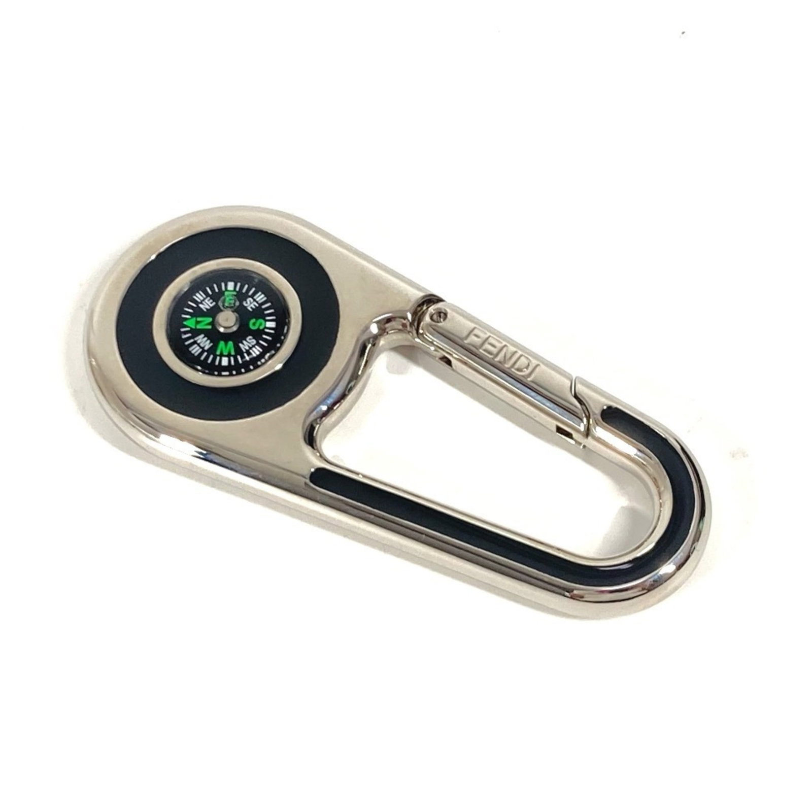 Fendi Keyring Metal: Fendi Keyring Metal The Fendi Keyring Metal is a silver metal keyring bearing a signature. It features a few traces of usage and some scratches/dirt, but remains in very good condition overall. This u