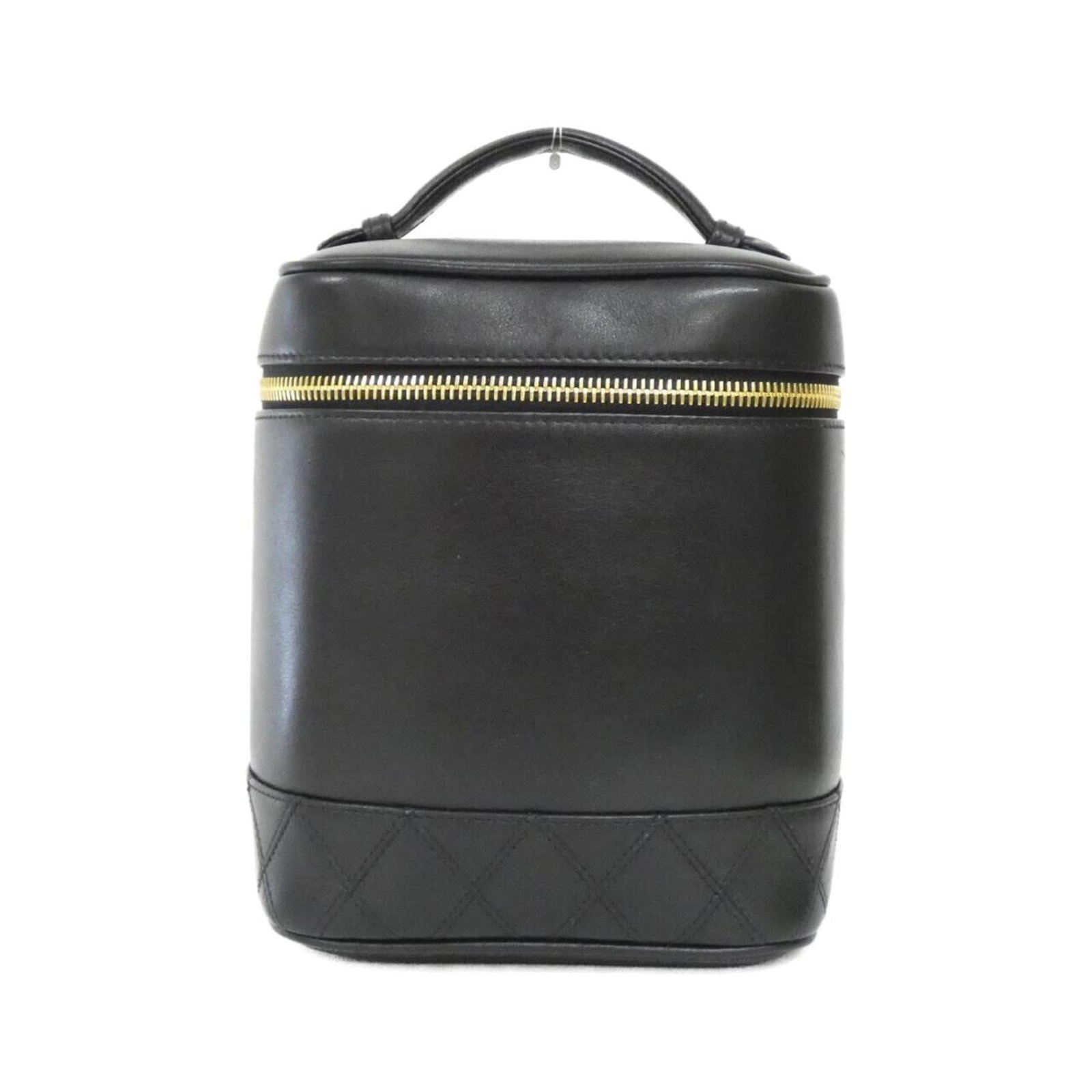 Chanel Handbag Leather: Chanel Handbag Leather Black lambskin Chanel handbag with gold hardware, featuring a sleek and sophisticated design. The bag has a few traces of usage, some scratches and dirt, but remains in very goo