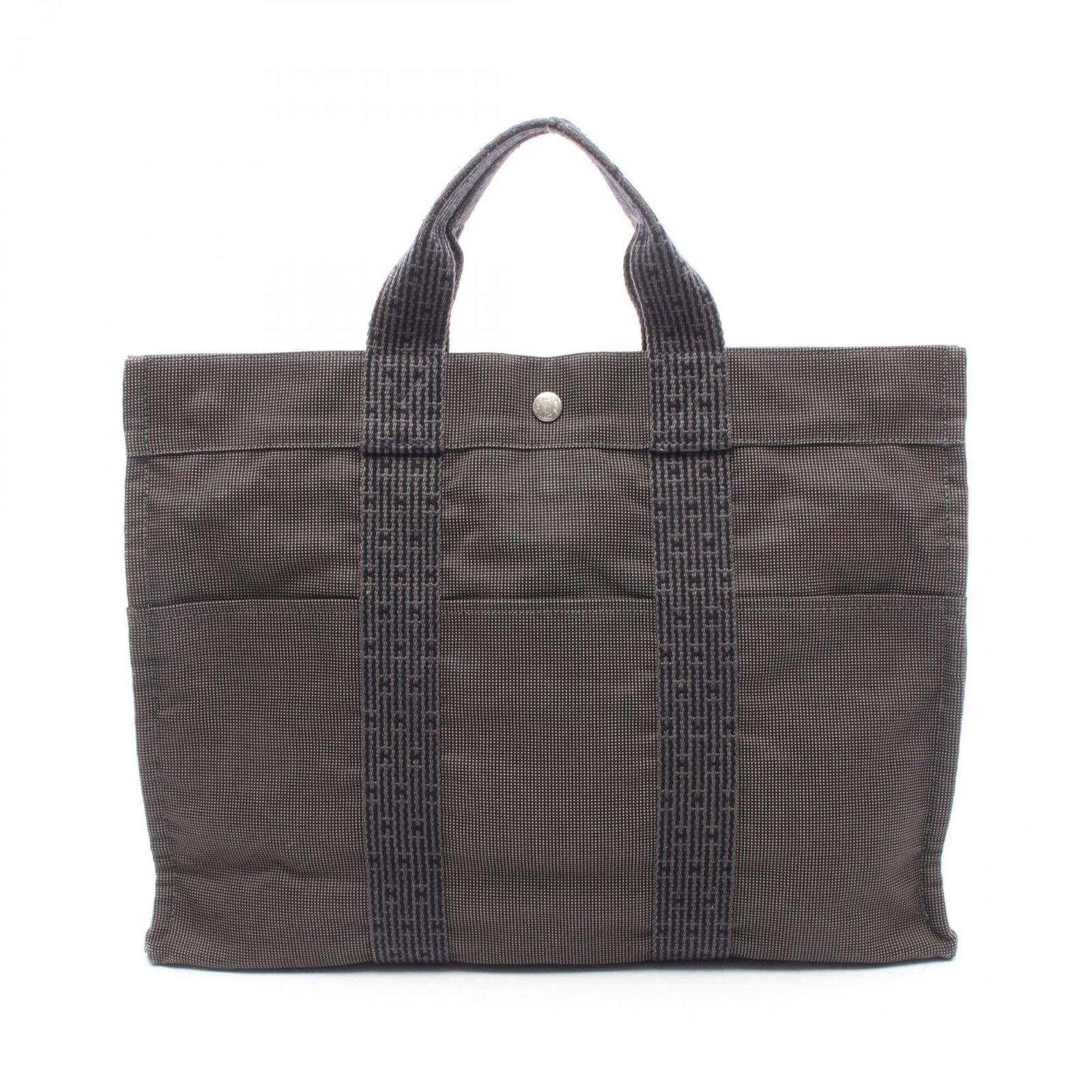 Hermes Handbag Tote Bag Canvas: Hermes Handbag Tote Bag Canvas Canvas tote bag from Hermes in gray, with a size of 32cm x 42cm x 11cm. The bag shows traces of usage and minor scratches/dirt, indicating its used condition. This