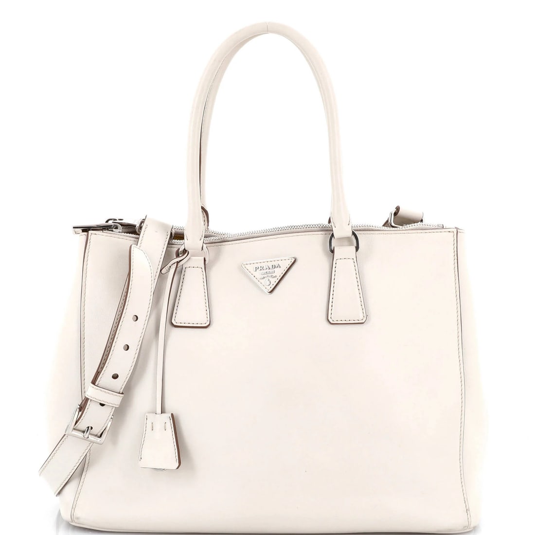 Strict Rules: Use Only Words from Original Title: Strict Rules: Use Only Words from Original Title White Prada Galleria Double Zip Tote with Suede Interior. This medium-sized leather satchel features a classic design with a double zip closure and mea