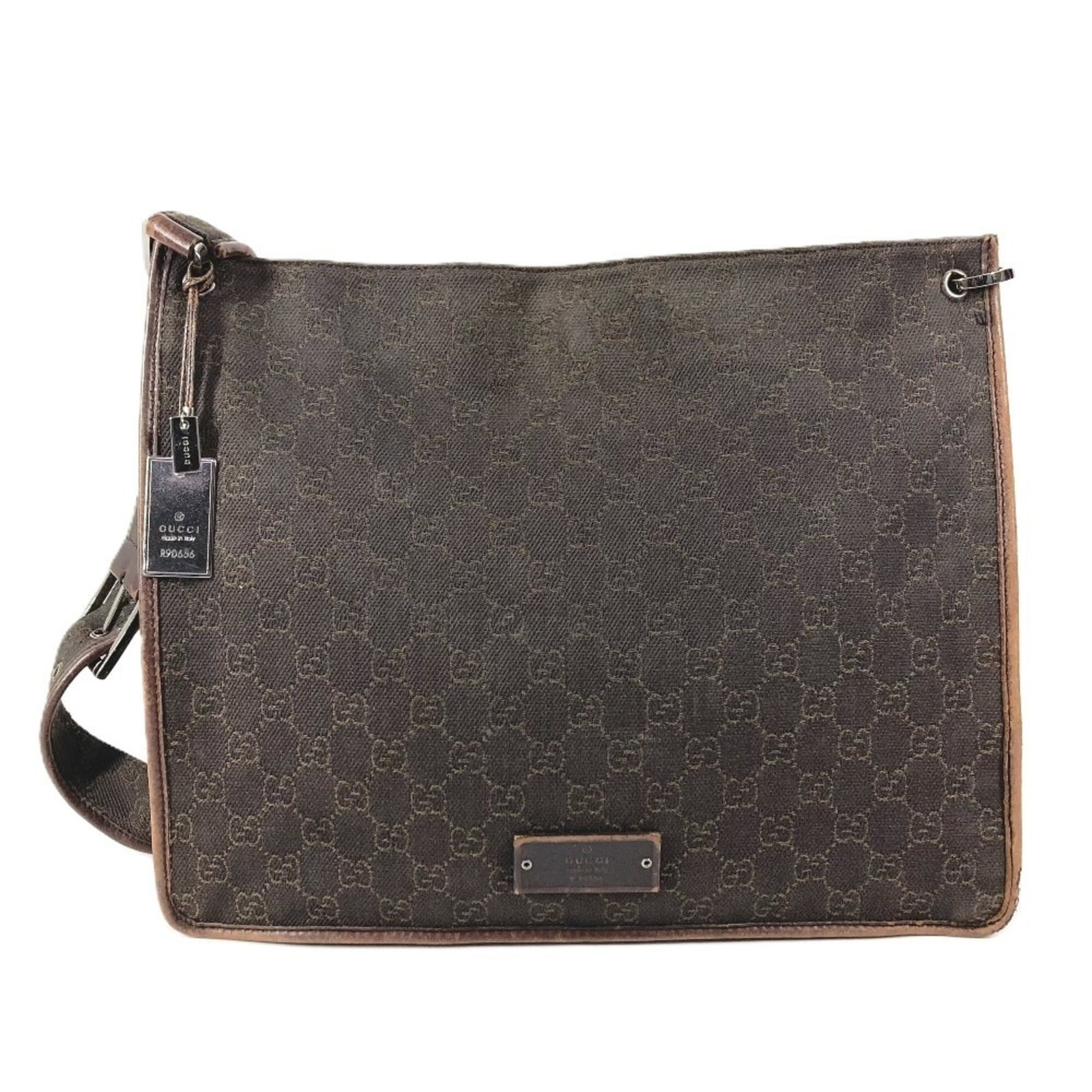 Gucci Shoulder Bag Leather Canvas: Gucci Shoulder Bag Leather Canvas This Gucci shoulder bag features a unique blend of leather and canvas materials in a rich brown color. With its classic design and spacious interior, this bag is perf