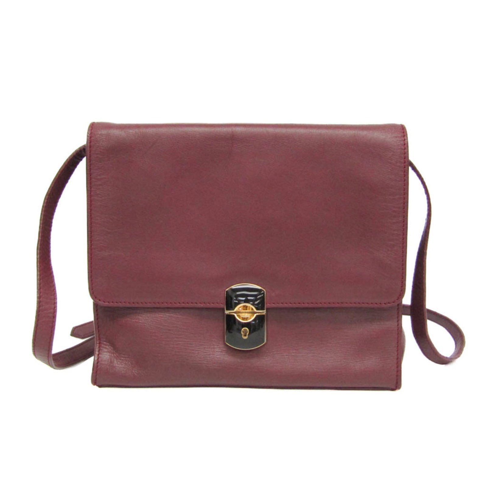 Balenciaga Shoulder Bag Leather: Balenciaga Shoulder Bag Leather The Balenciaga Shoulder Bag Leather features a sleek design with a push lock closure and an inner zipper pocket for added convenience. Its rich wine color and premium l