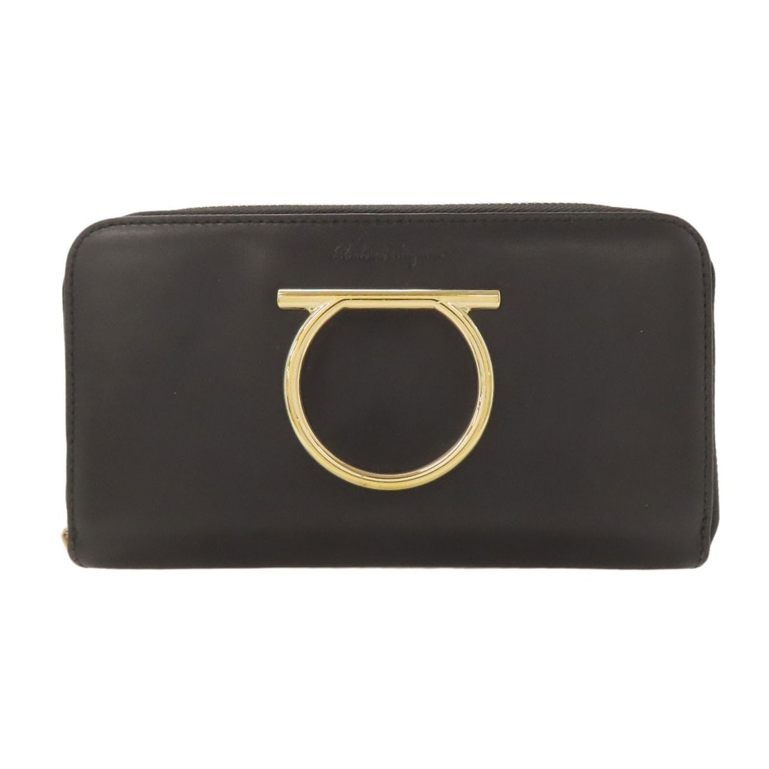 hardware leather wallet gancini coin long ferragamo salvatore: hardware leather wallet gancini coin long ferragamo salvatore Black leather wallet features a long design with a coin pocket, showcasing Salvatore Ferragamo's iconic style. The exterior is made of