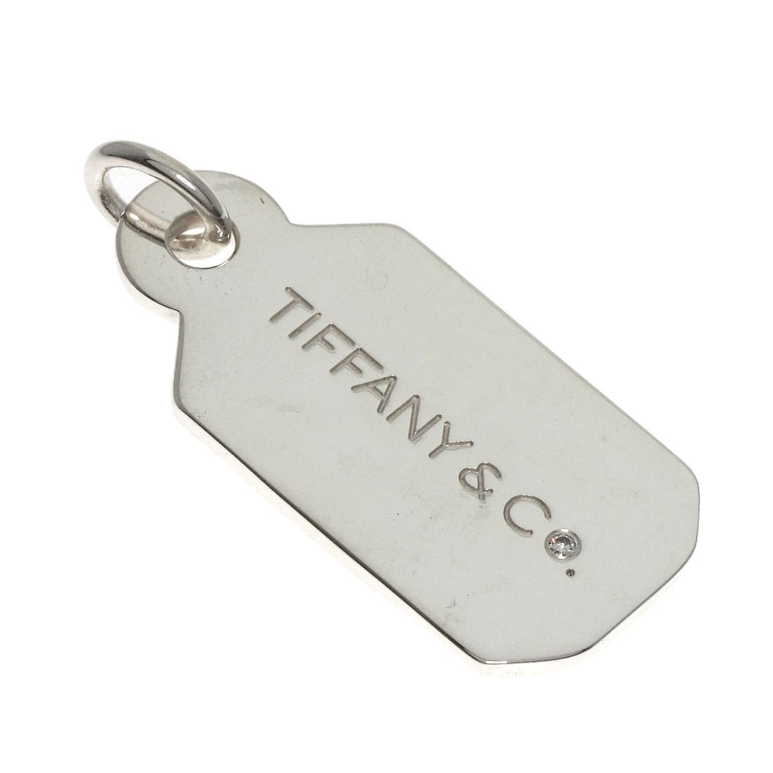 Strict Rules Apply Only To Tiffany Co.: Strict Rules Apply Only To Tiffany Co. Strictly a Tiffany & Co. pendant in silver metal with a diamond top, this piece showcases its sleek design and luxurious materials. The main stone is a notable f