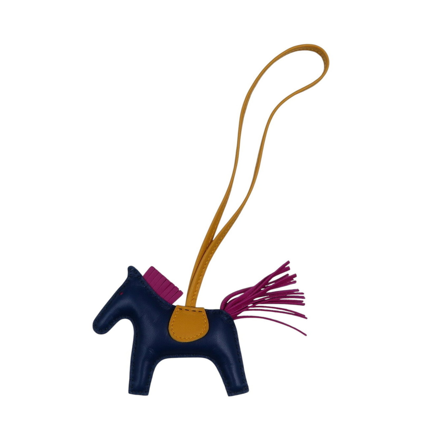 Hermes Handbag Charm Agneau Milo: Hermes Handbag Charm Agneau Milo Agneau Milo charm from Hermes features a striking blue hue. This used handbag charm has some scratches and dirt, with only minor traces of usage visible. Overall, its 