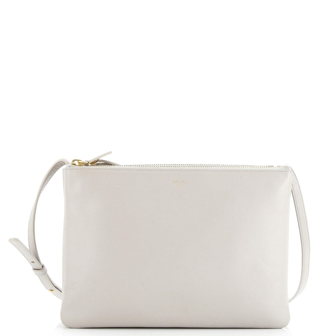 Strict rules apply: Strict rules apply The Celine Trio Crossbody Bag in gray leather features a classic design with a large size and gold hardware. With its sturdy straps and comfortable handle drop, this bag is perfect 
