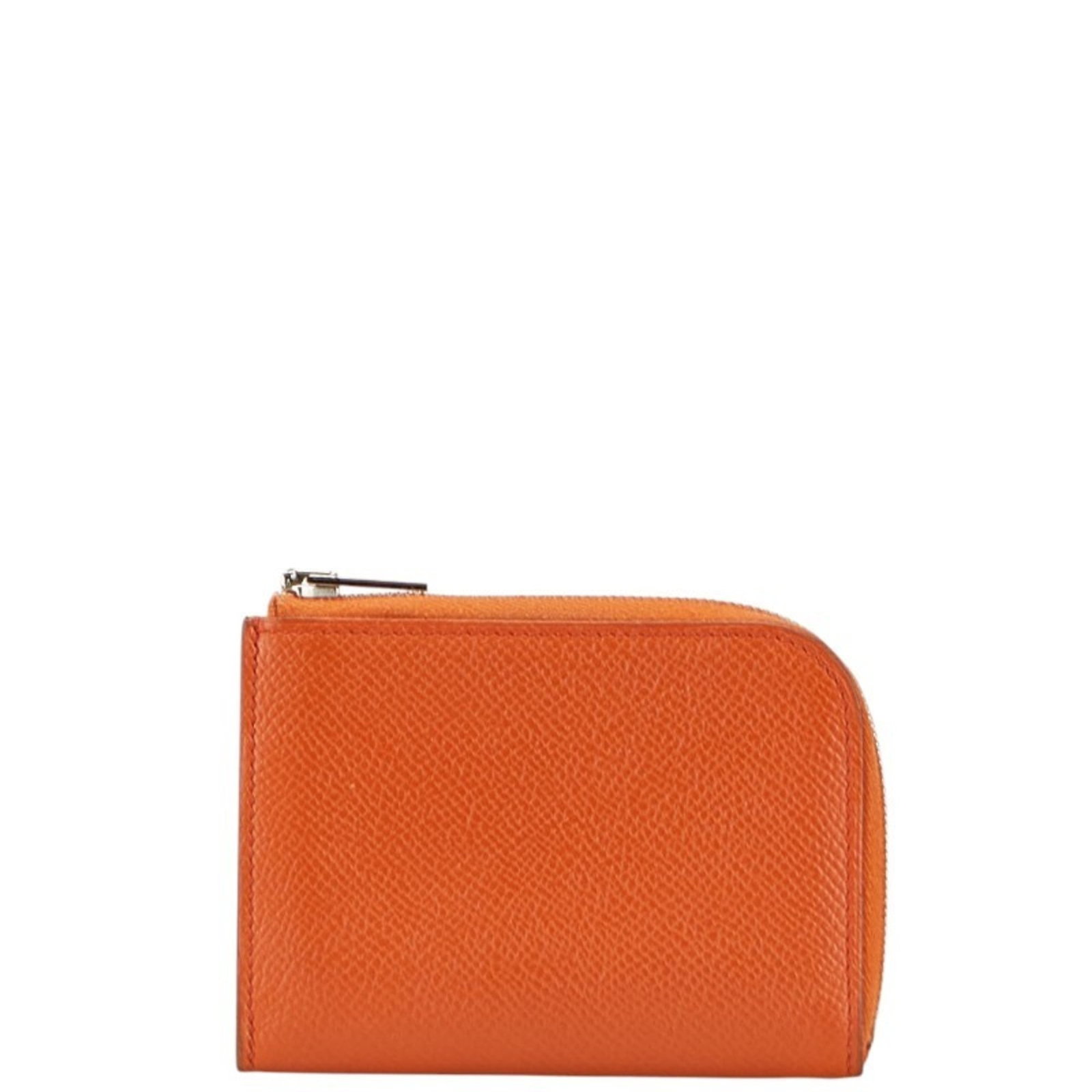 Hermes Coin Purse/Coin Case Epsom Leather: Hermes Coin Purse/Coin Case Epsom Leather The Hermes Coin Purse/Coin Case Epsom Leather is a unique accessory featuring vibrant orange Epsom leather and a functional zipper closure. Measuring 7.5cm x