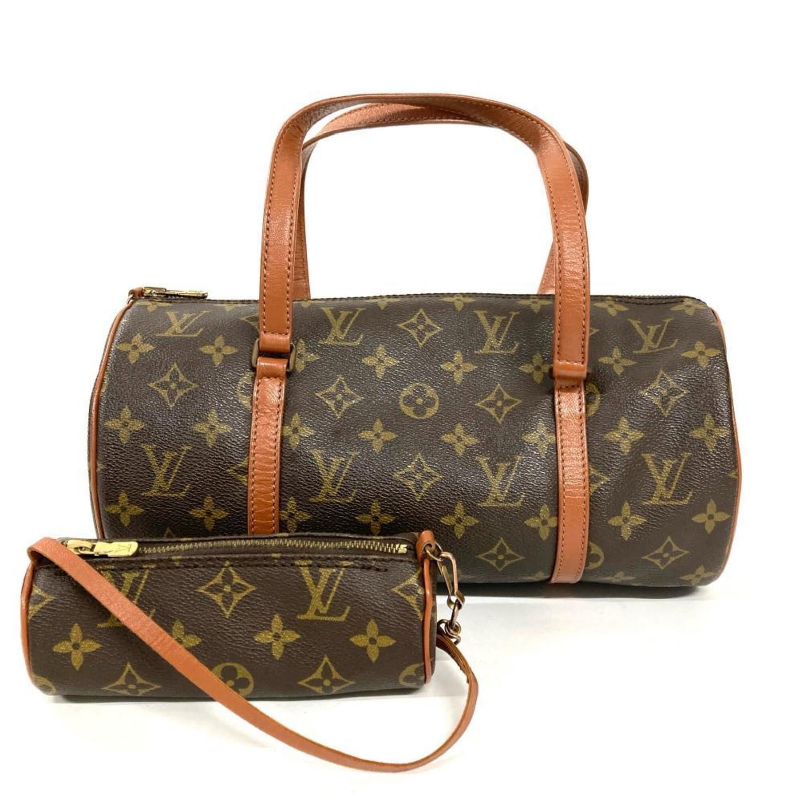 Louis Vuitton Handbag Monogram: Louis Vuitton Handbag Monogram Brown Louis Vuitton Monogram Handbag with Traces of Usage. This classic handbag features the iconic monogram pattern and has a sturdy design with a 47cm handle length. W