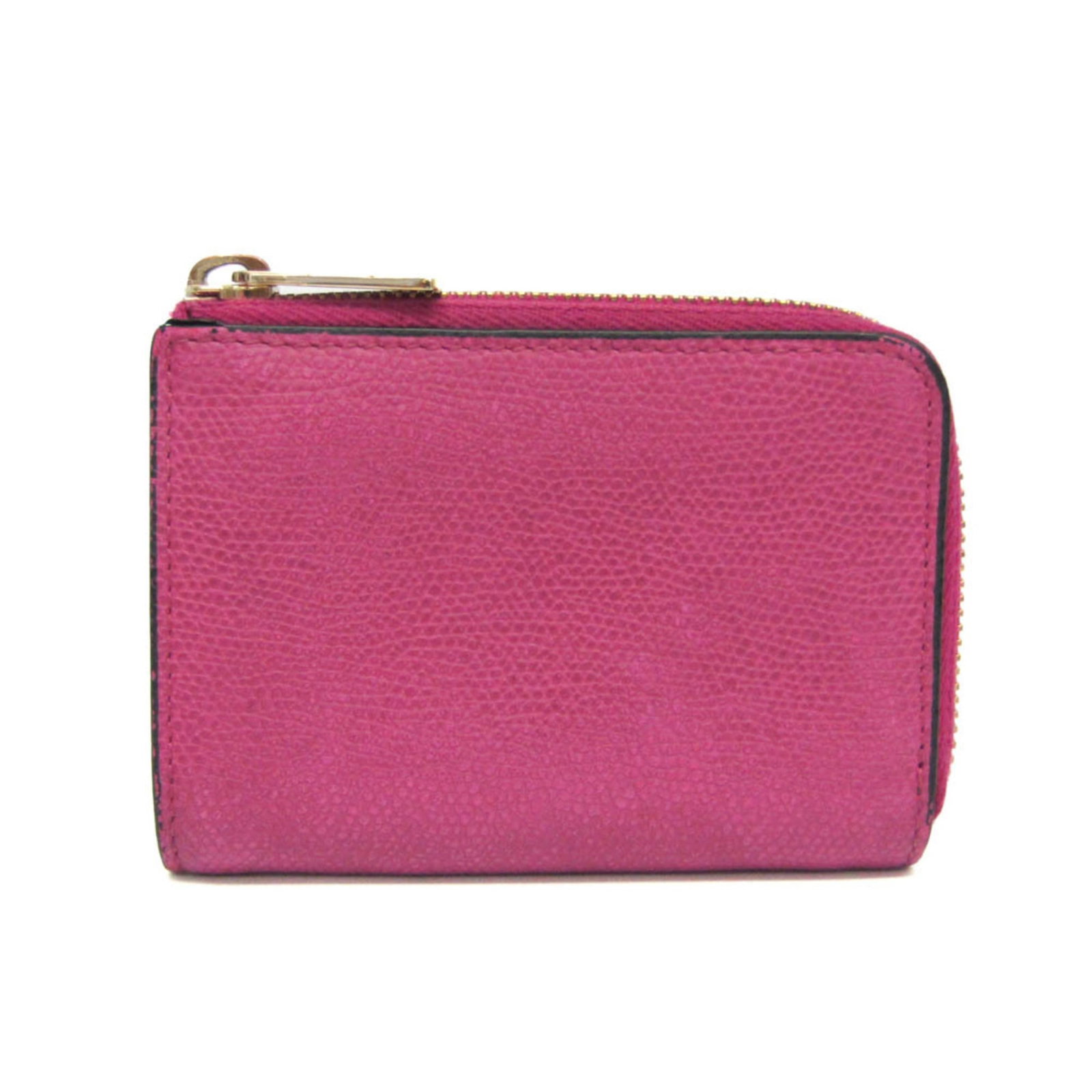 Valextra Coin Purse/Coin Case Leather: Valextra Coin Purse/Coin Case Leather This elegant leather coin purse features a rich purple hue and a sleek design, with a secure zipper closure and two convenient pockets for cards and keys. The dur