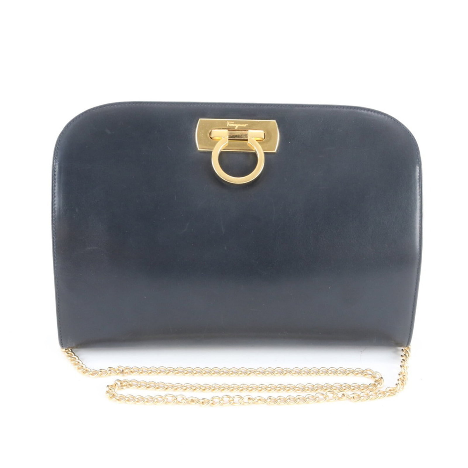 Salvatore Ferragamo Shoulder Bag Leather: Salvatore Ferragamo Shoulder Bag Leather Dark navy leather shoulder bag from Salvatore Ferragamo, featuring a classic design with a 20cm x 28cm x 5cm size. The bag shows signs of usage, including