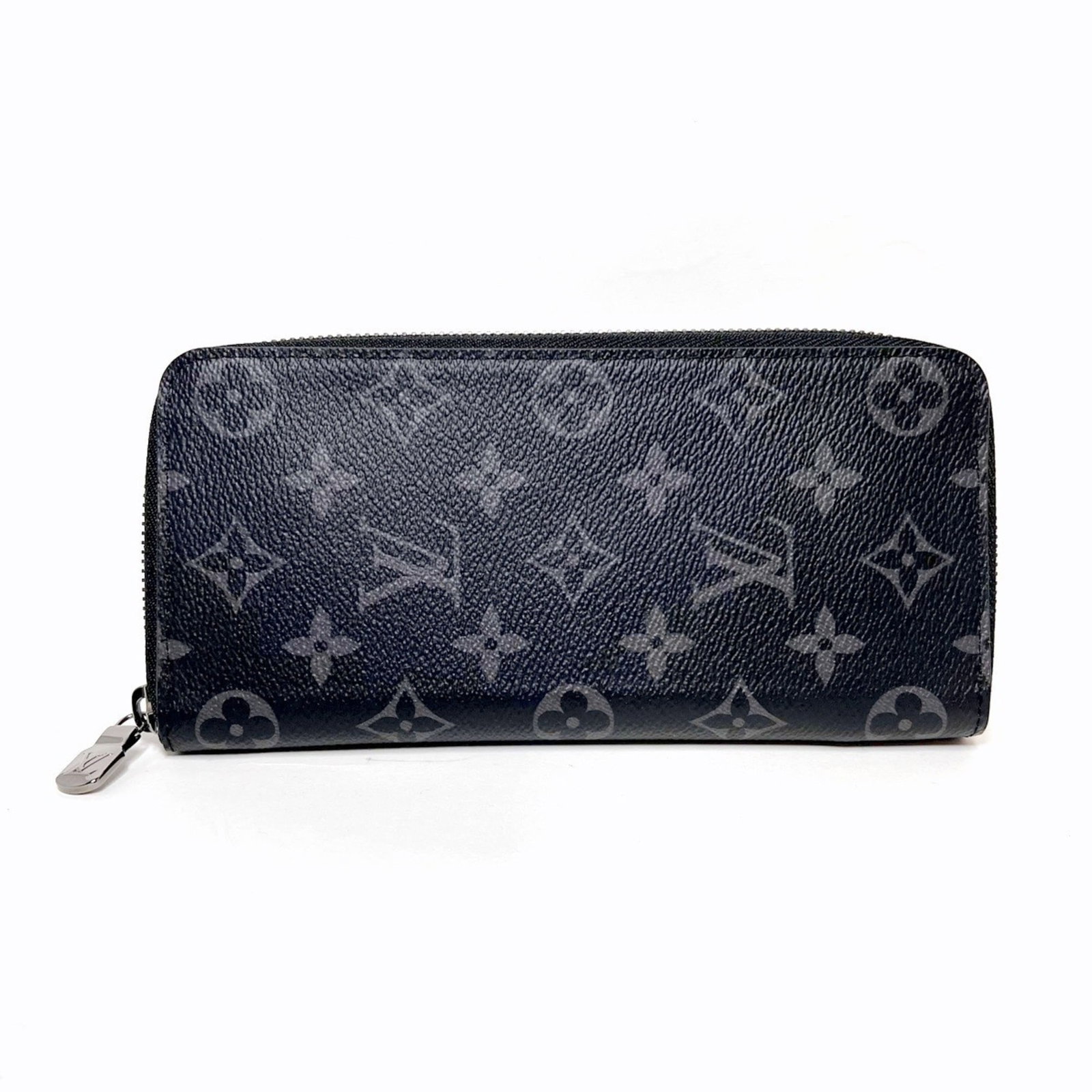 Louis Vuitton Long Wallet (Bi-Fold) Monogram Eclipse: Louis Vuitton Long Wallet (Bi-Fold) Monogram Eclipse Monogram Eclipse leather adds a touch of sophistication to this Louis Vuitton bi-fold wallet. With its classic design and timeless style, this long