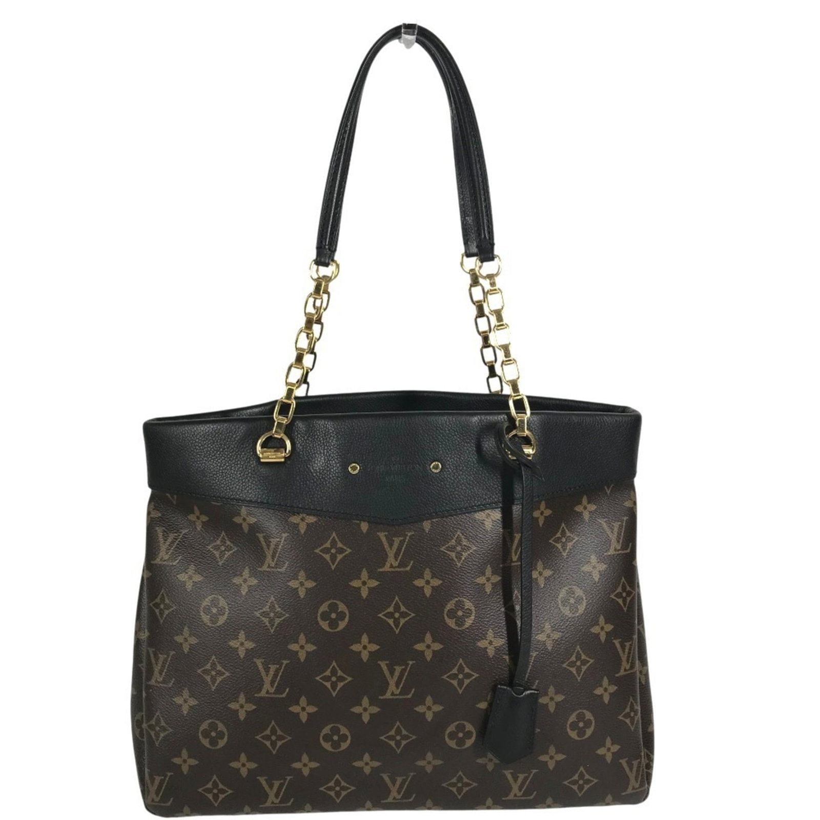 Louis Vuitton Shoulder Bag Tote Bag Monogram: Louis Vuitton Shoulder Bag Tote Bag Monogram The iconic Louis Vuitton Monogram shoulder bag tote offers timeless elegance with its classic design and distinctive black monogram pattern. This pre-owned
