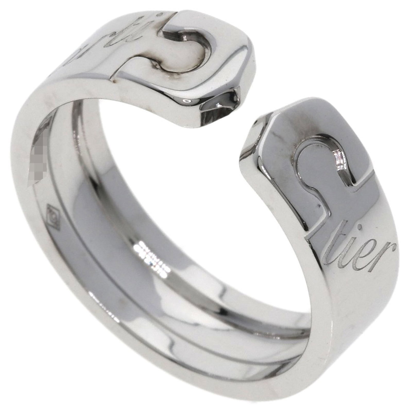 Cartier Band Ring: Cartier Band Ring Cartier Band Ring features an 18K white gold band with a few traces of usage and minor scratches. The ring measures 5.9mm in width and weighs 7.1g, making it a subtle yet elegant acc