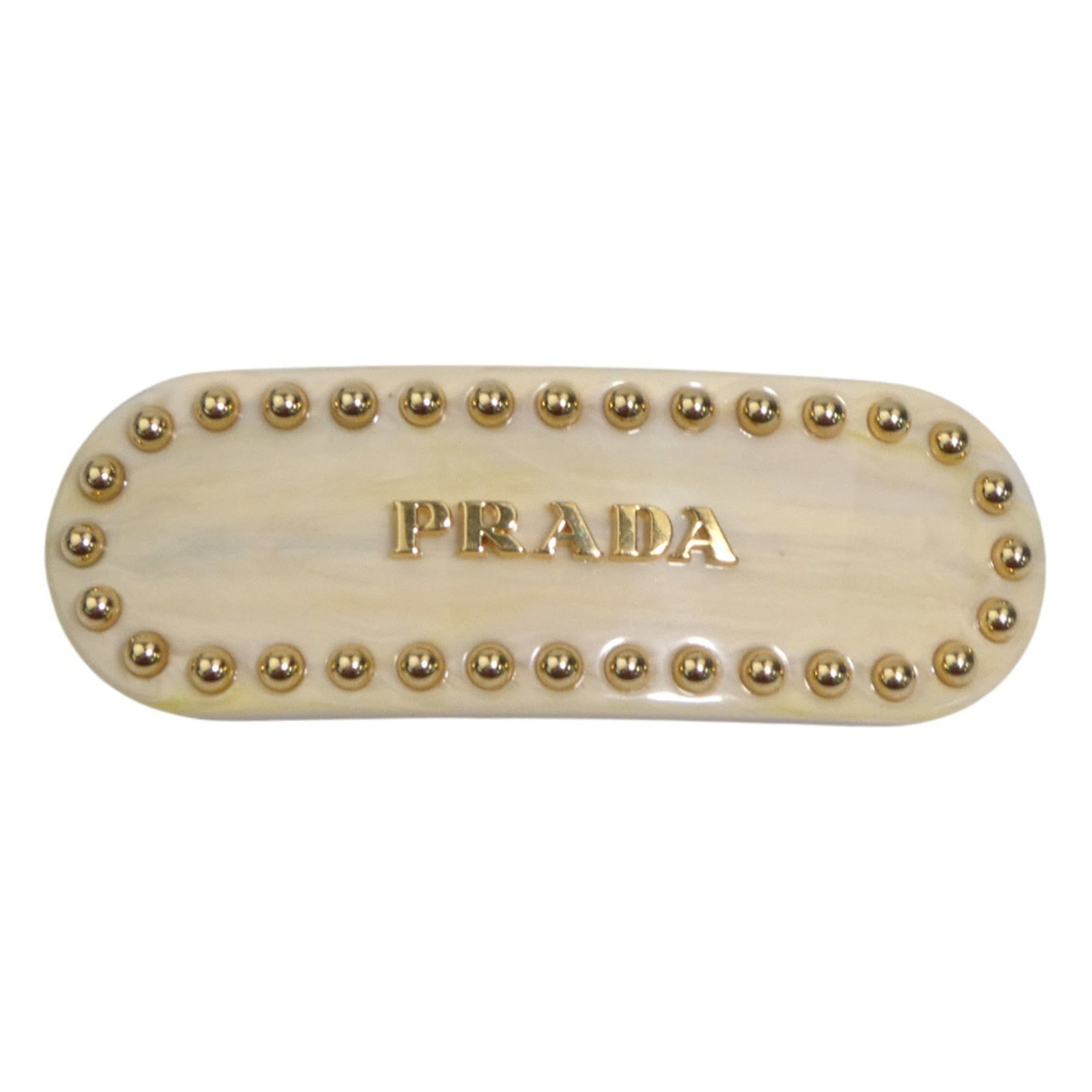 Prada Barrette Resin: Prada Barrette Resin Used Prada Barrette Resin in cream color, bearing some scratches and dirt. Made of resin material with dimensions 2.5cm x 7cm. Overall in very good condition despite minor traces