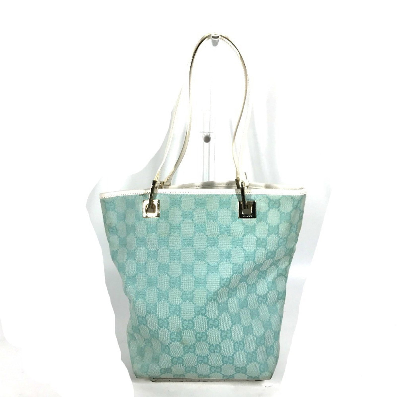 Gucci Shoulder Bag Tote Bag Canvas Leather: Gucci Shoulder Bag Tote Bag Canvas Leather Gucci's iconic shoulder bag tote features a striking blue and white canvas leather design. With its classic shape and timeless style, this versatile bag can 