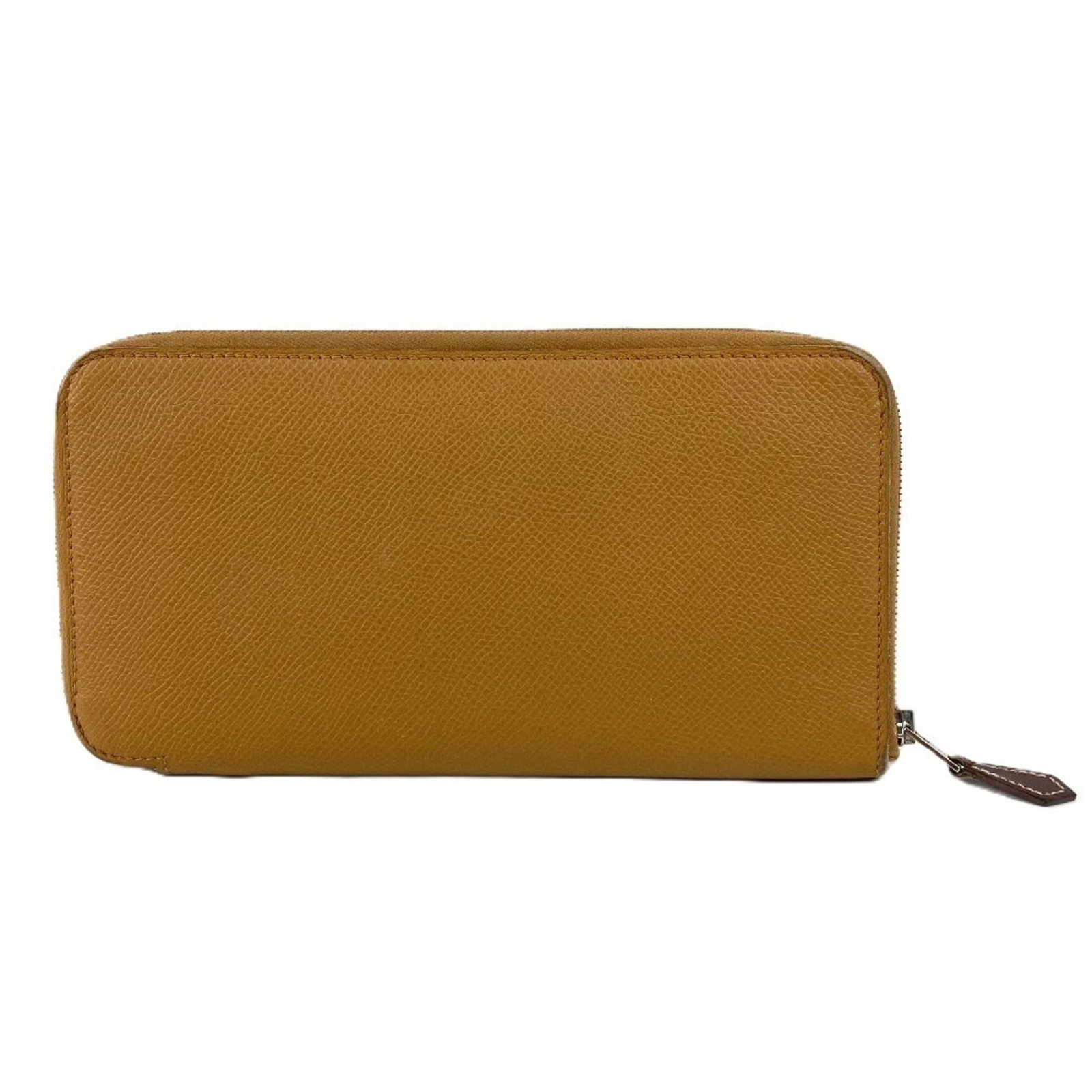 Hermes Long Wallet (Bi-Fold) Epsom Leather: Hermes Long Wallet (Bi-Fold) Epsom Leather Epsom leather craftsmanship shines in this classic Hermes bi-fold wallet, featuring a timeless beige color and durable design. The subtle scratches and signs