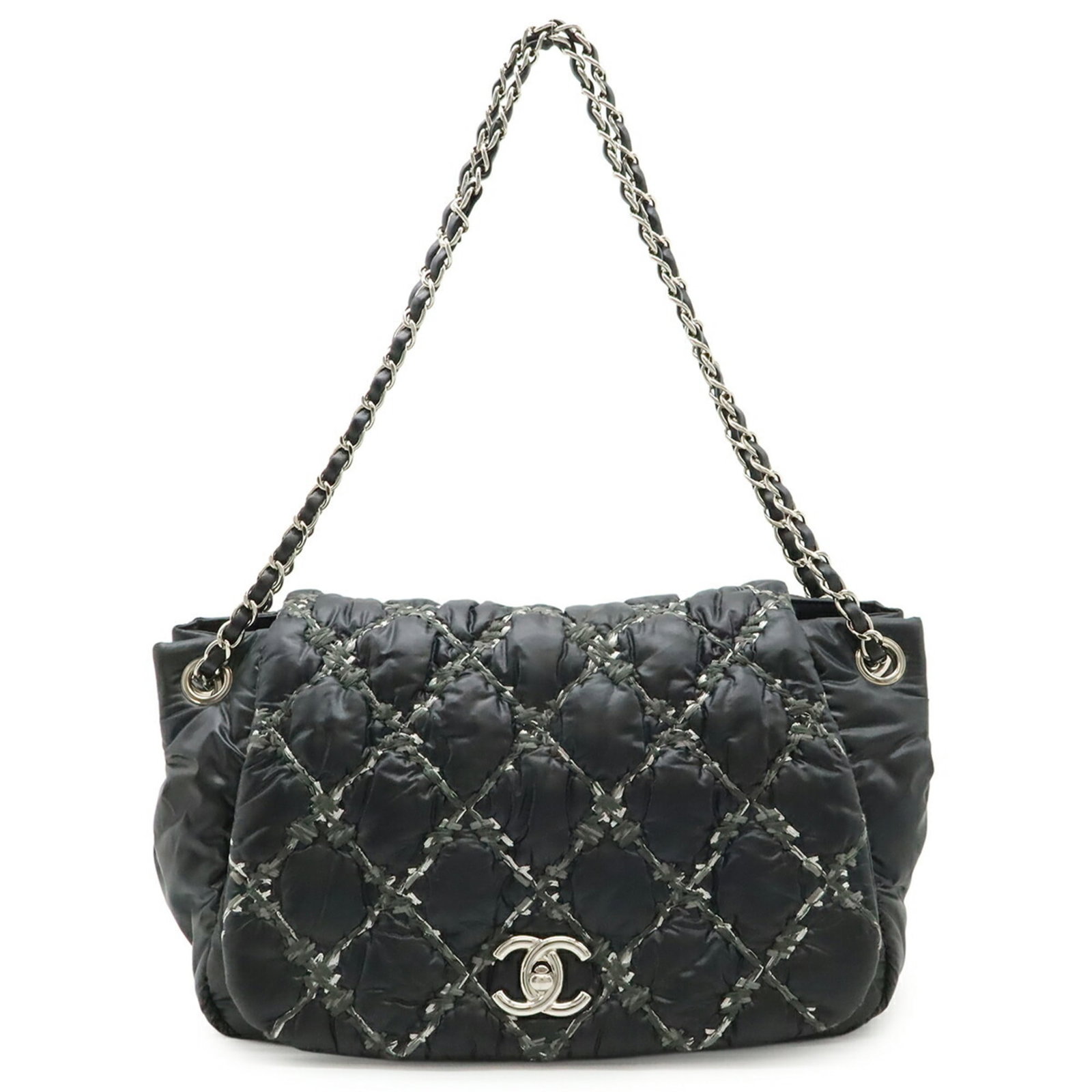 Chanel Shoulder Bag Nylon: Chanel Shoulder Bag Nylon Chanel's iconic shoulder bag in black nylon boasts a sleek design with clean lines and a versatile size. Measuring 22cm x 28cm x 14cm, this stylish accessory features a few s