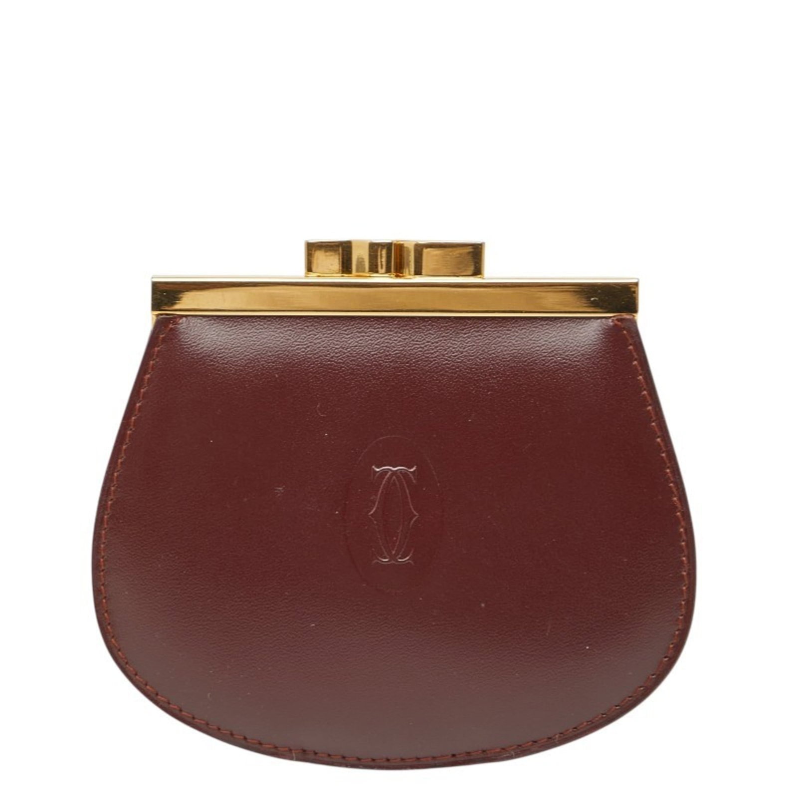 Cartier Coin Purse/Coin Case Leather: Cartier Coin Purse/Coin Case Leather Cartier Coin Purse/Coin Case Leather in Bordeaux. This used leather coin purse features a classic design and wine red color, with some traces of usage visible on i