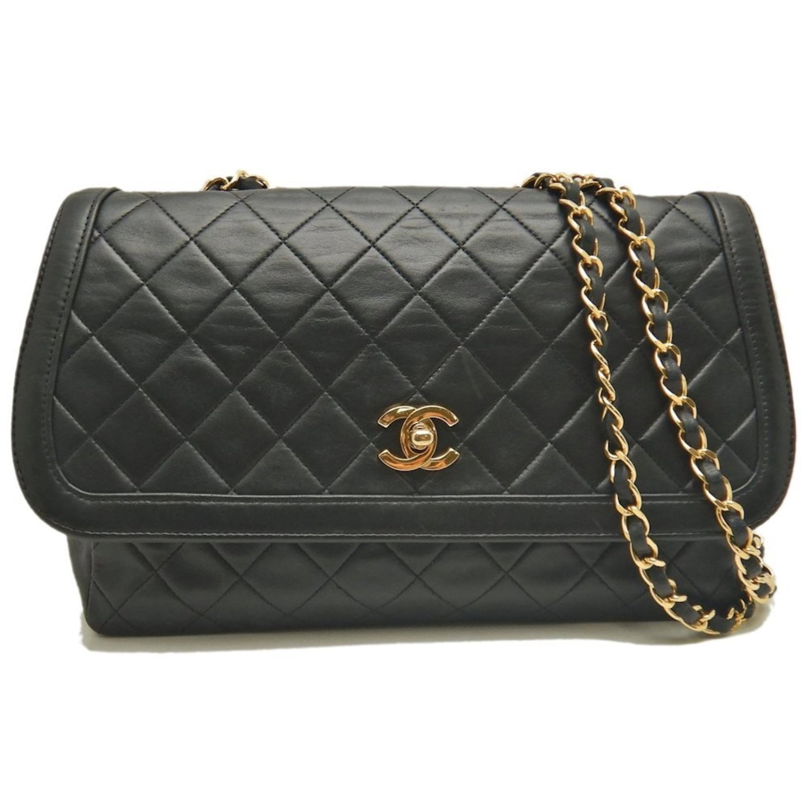 Chanel Shoulder Bag Leather: Chanel Shoulder Bag Leather This black Chanel shoulder bag features lambskin leather and measures 16cm x 26cm x 8cm. With its classic design and timeless style, this bag showcases the iconic Chanel br