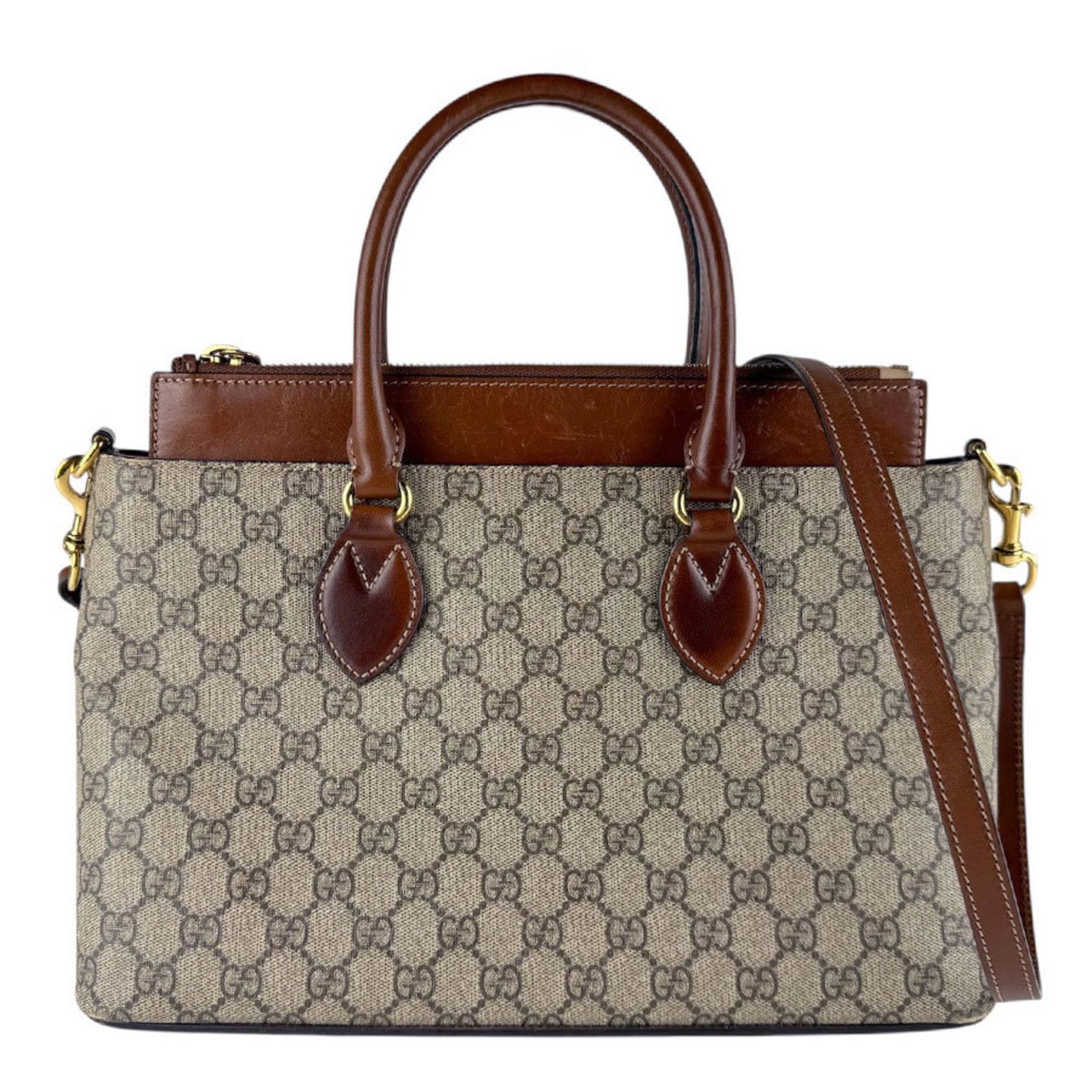 Gucci Handbag Shoulder Bag Gg Supreme: Gucci Handbag Shoulder Bag Gg Supreme Gucci's iconic Gg Supreme handbag features a timeless brown color and sturdy design, with a zipper closure and adjustable straps for a comfortable fit. Measuring